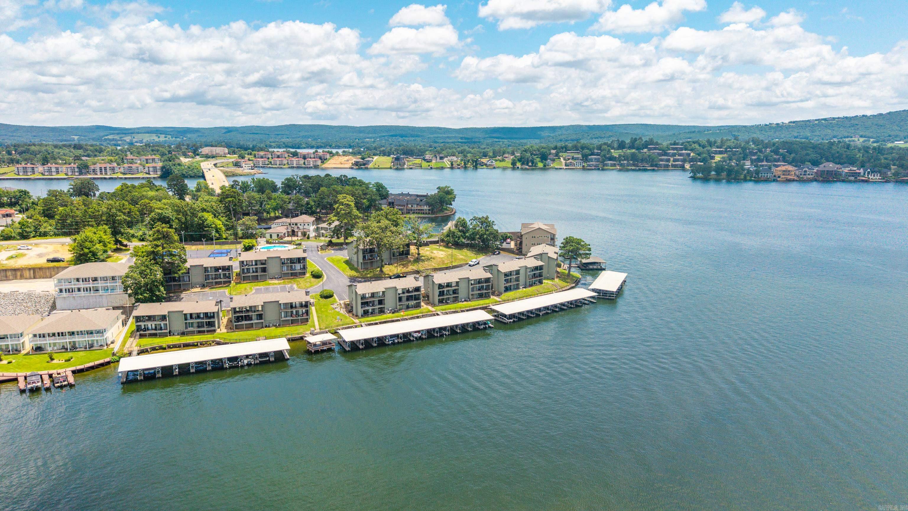 Experience lake living at its finest with this stunning 2bedroom, 2bath condo offering breathtaking main channel views! Located in one of the most sought-after areas, this property is an active short term rental, making it the perfect investment opportunity or personal lake getaway. Enjoy beautiful water views, relaxing sunsets, and everything Hot Springs lake life has to offer. Don’t miss your chance to own a piece of the lake!