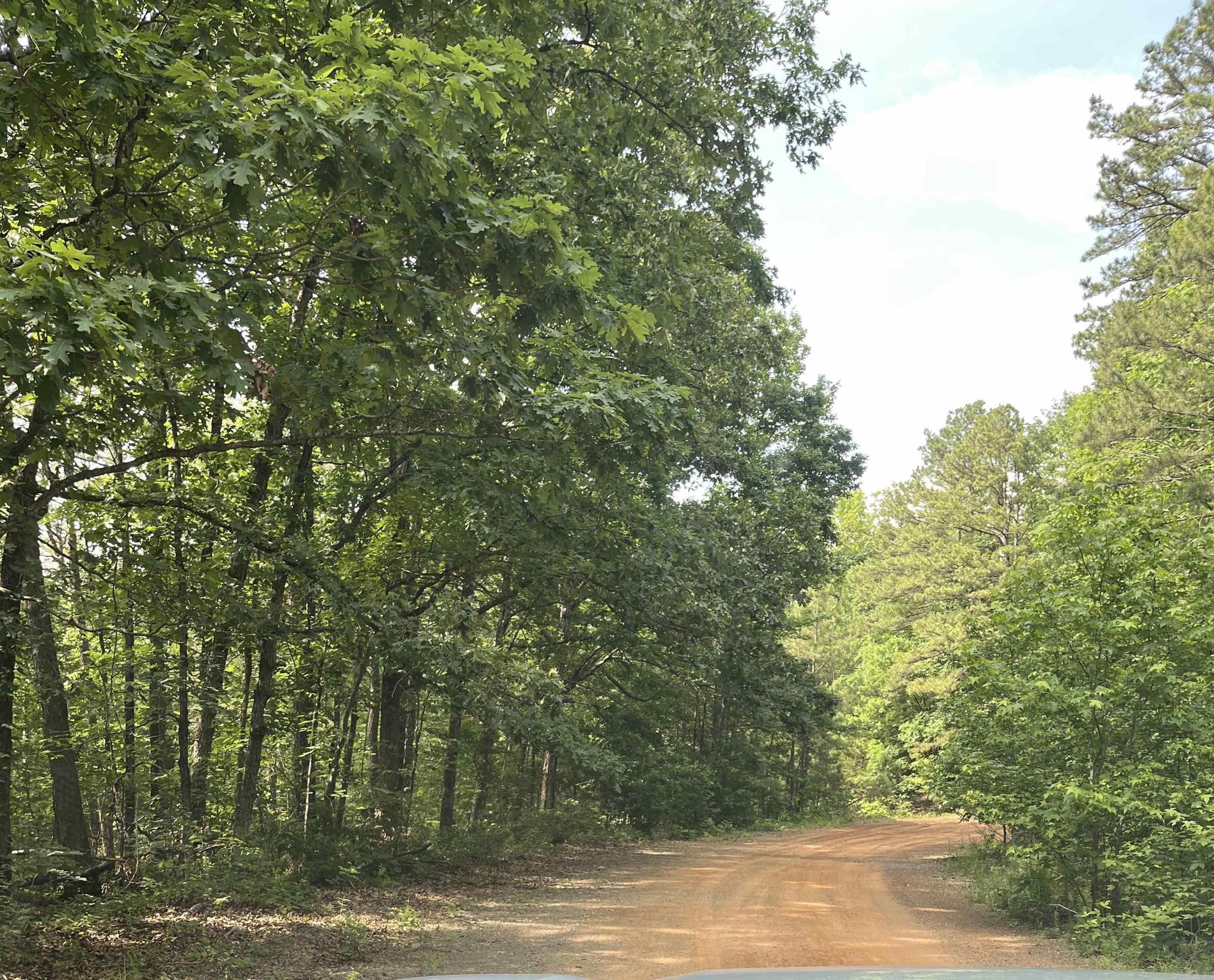 Lot in Fairfield Bay close proximity to Greers Ferry Lake, Mountain Ranch golf course and local amenities. Utilities are available at the road.