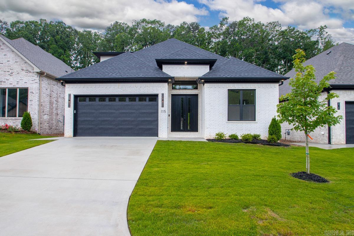 Stunning Luxury New Construction-4BR, 3.5BA+Bonus Room.   This home boast high-end finishes and premium craftsmanship throughout.  Inside, a grand entryway with a statement light fixture leads to light wood floors and an open-concept layout. The spacious living room features a cozy fireplace and huge windows that flood the home with natural light. Oversized glass sliding doors offer a seamless connection to the peaceful outdoor living space with fireplace. The functional designer kitchen boasts a gas stove, modern cabinetry, and an open dining area perfect for entertaining. The main-floor primary suite is a true retreat with a spa-like bath, deep soaker tub, and glass shower. One additional bedrooms and one-half bath reside on the main level. Upstairs, secondary living space. two bedroom, full bath, as well as attic space for extra storage. Located in a desirable neighborhood with amenities including a community pool, park (opening soon). Conveniently located near Costco Wholesale, Kroger, and The Promenade at Chenal for shopping, dining, and everyday convenience. Virtual staged.
