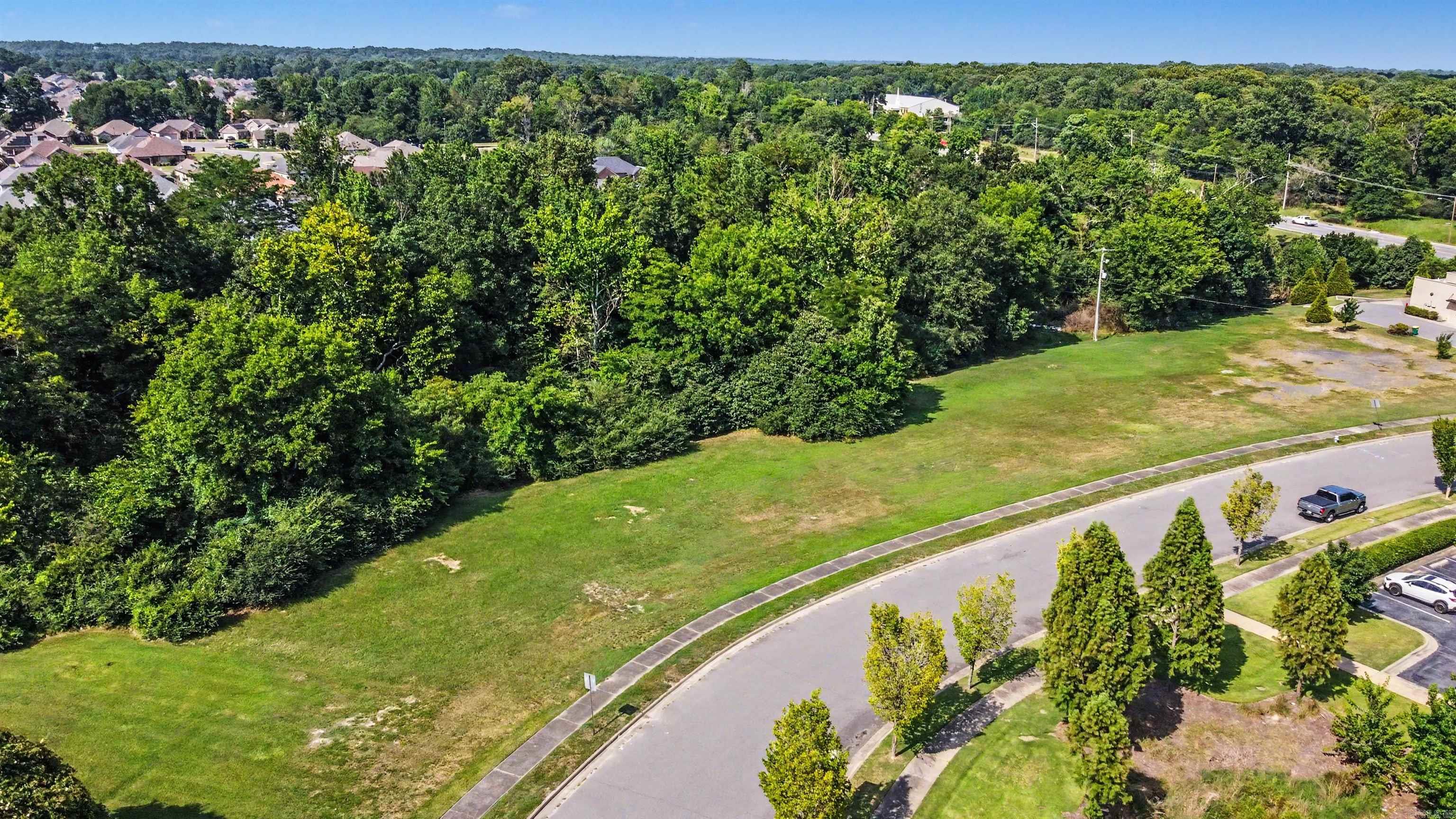 Prime commercial lot with excellent visibility and easy access. This level parcel offers outstanding potential. Conveniently located near major roads, established businesses, and growing residential communities. A great opportunity to build in a high-traffic, desirable location. See duplicate listing 26030413.