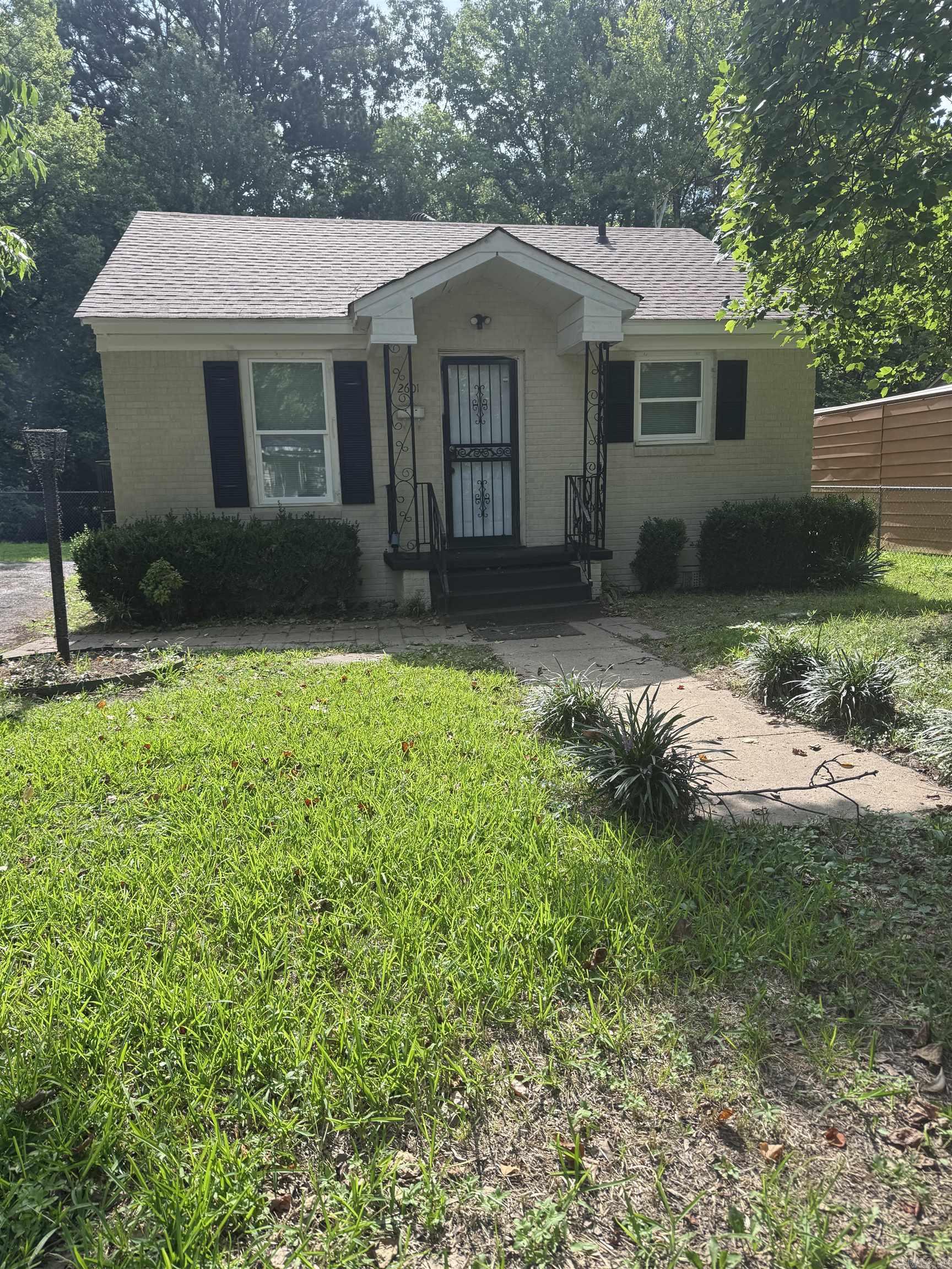 Location, convenience, and top-tier updates! Situated just moments from UALR in the popular Fairpark neighborhood. This two bedroom one bath home is an incredible opportunity for students, first-time homebuyers, or investors looking for a turn-key property. Rest easy knowing the major items are taken care of with a newer roof, a newer water heater, new windows and brand-new stainless steel appliances already in place! The low-maintenance painted brick exterior opens up to a beautifully modernized interior. The layout features comfortable living spaces with fresh carpet and paint, leading into a gorgeously upgraded kitchen. Equipped with brand-new appliances, crisp white cabinetry, modern black fixtures, and striking countertops, this kitchen maximizes both style and functionality. Don't miss out on this gem. Square foot approximate please measure.