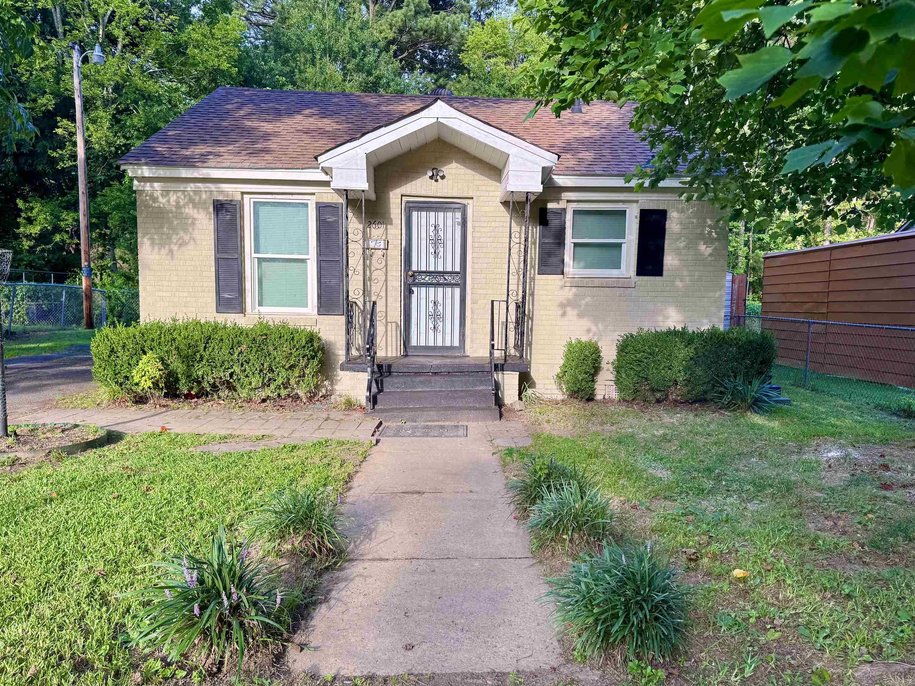 Location, convenience, and top-tier updates! Situated just moments from UALR in the popular Fairpark neighborhood. This two bedroom one bath home is an incredible opportunity for students, first-time homebuyers, or investors looking for a turn-key property. Rest easy knowing the major items are taken care of with a newer roof, a newer water heater, new windows and brand-new stainless steel appliances already in place! The low-maintenance painted brick exterior opens up to a beautifully modernized interior. The layout features comfortable living spaces with fresh carpet and paint, leading into a gorgeously upgraded kitchen. Equipped with brand-new appliances, crisp white cabinetry, modern black fixtures, and striking countertops, this kitchen maximizes both style and functionality. Don't miss out on this gem. Square foot approximate please measure.