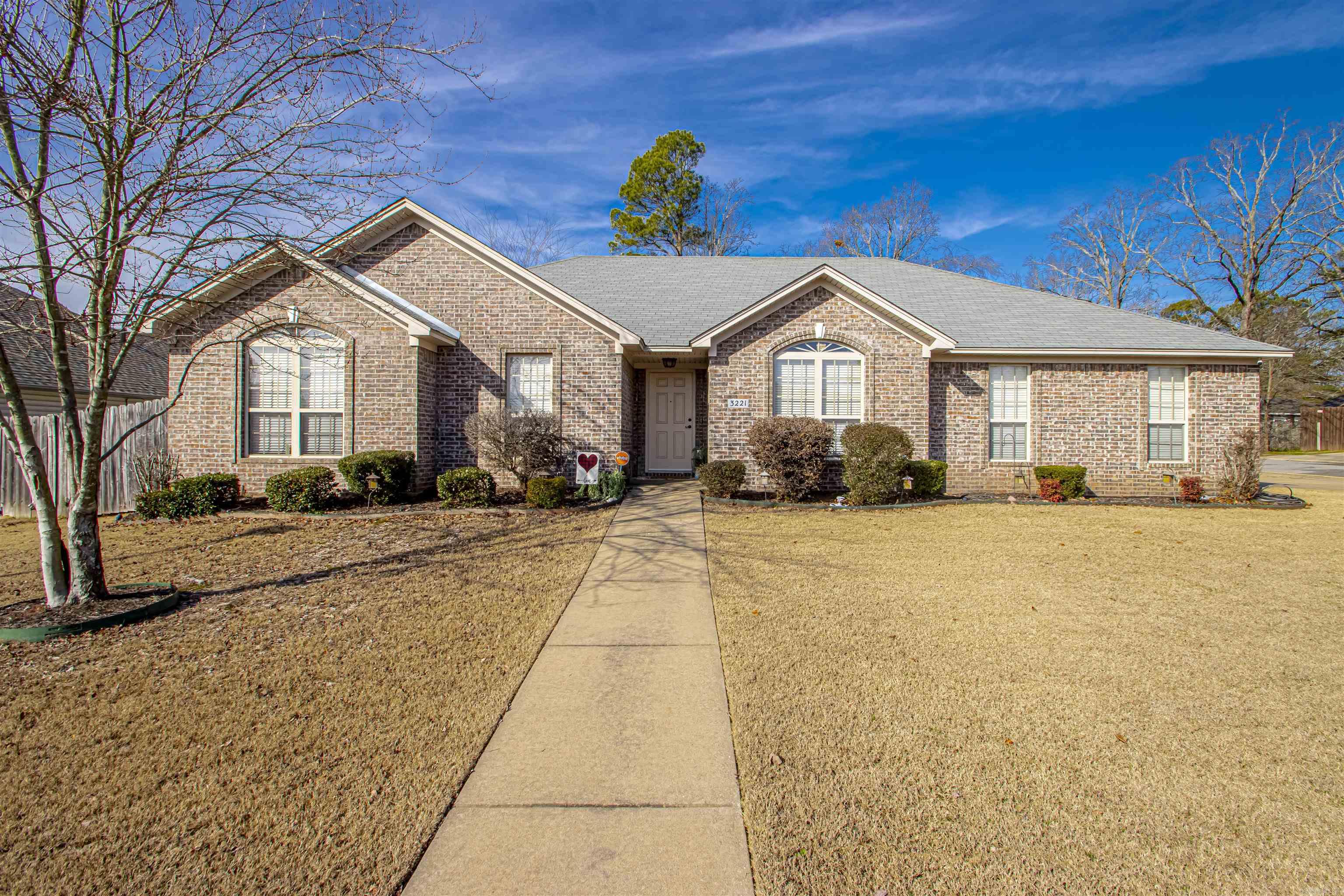 Welcome to 3221 Ozark Drive, Bryant, Arkansas. This well-maintained home on a beautiful corner lot boasts great curb appeal. With 1996 sq ft, 4 bedrooms, and 2 bathrooms, it offers abundant natural light throughout. Enjoy a cozy living room with a gas fireplace and spacious closets in every room. The primary bedroom ensures extra privacy from guest bedrooms, featuring a great master bathroom accessed through double doors. Flexibility abounds with a kitchen nook, formal dining room, or office space. A new roof was installed May of 2023. Situated near an abundance of restaurants, shopping centers, and Bryant schools, this gem won't last long. This is the perfect place to call home! Schedule a showing today. See agent remarks before showing.