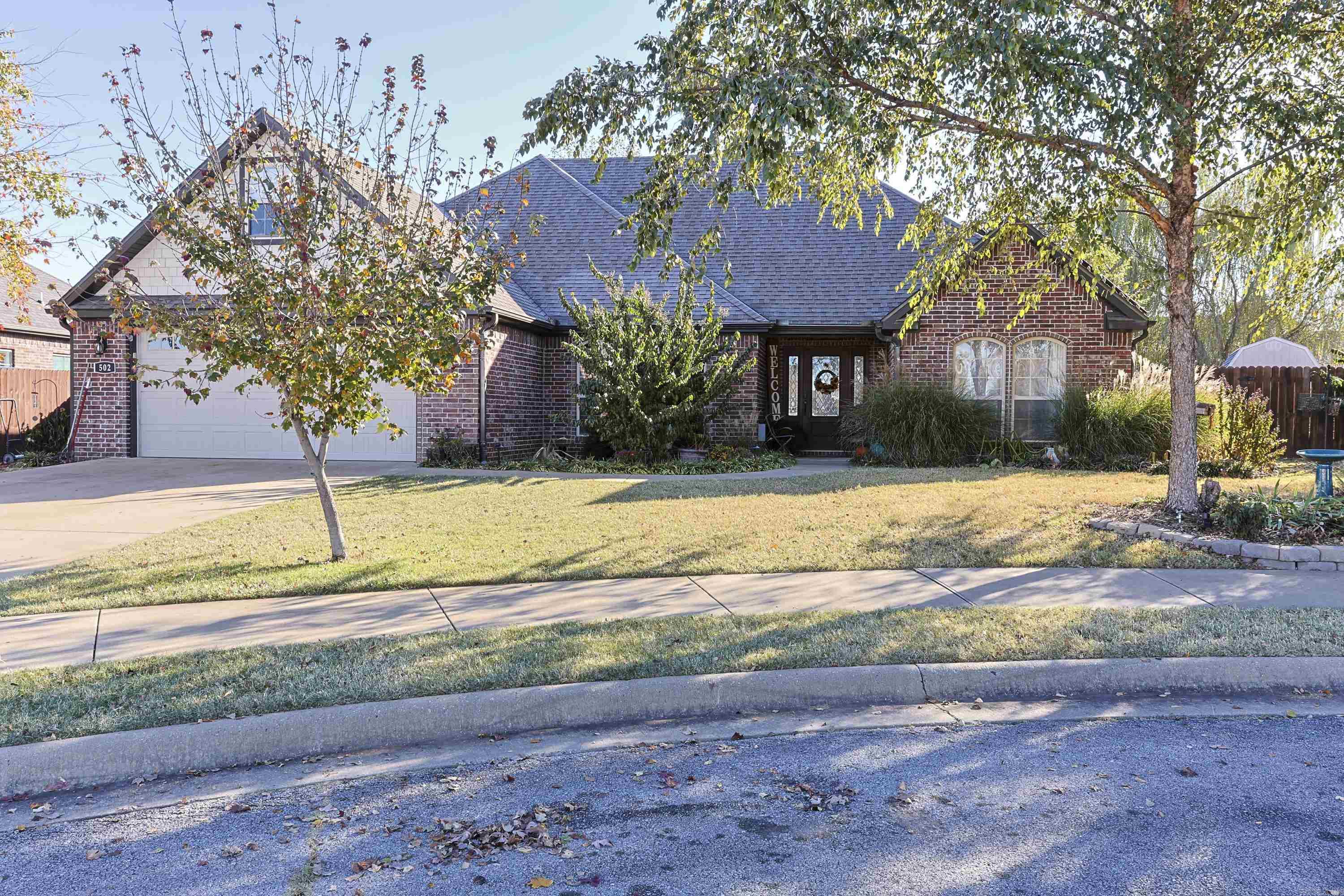 AGENT OWNED: Charming home in wonderful neighborhood. Minutes from historic downtown Siloam Springs and John Brown University. This home features 3 downstairs bedrooms, 2 baths and a powder room, and a spacious laundry room. Perfect for a family and minutes from all schools. Convenient to Bentonville/Rogers as well as Fayetteville and Springdale. The home also features recent carpets, paint, and new HVAC in 2023. Bonus room is finished upstairs, though not counted in square footage. Two car garage. Come enjoy your backyard oasis or cool off in the aquatic center less than two minutes away. Walking and hiking trails, mountain bike trails, and city lake are also less than 5 minutes from your front door. Home also features solar panels, garden area, gorgeous patio and landscaping. Refrigerator, washer, and dryer convey if desired.