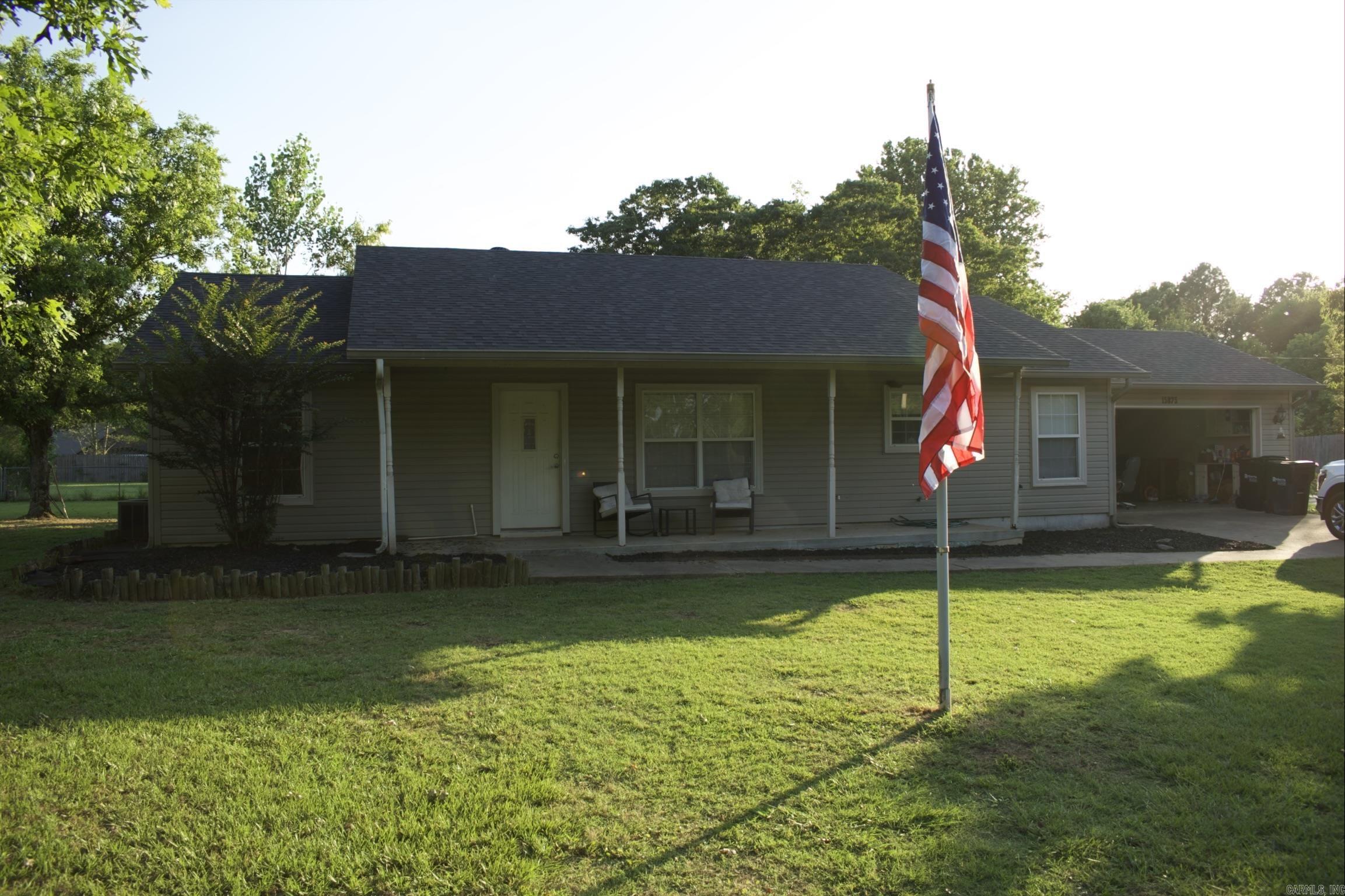 Escape to peaceful country living on approximately 1.85 acres. This one-level, 3-bedroom, 2-bath home offers 1,450 square feet of comfortable living. Inside, you'll find an open layout with a kitchen and breakfast bar. Outside, the yard is ready for your personal touch, and a workshop with a large yard that offers endless possibilities. And the roof was replaced at the end of 2025.