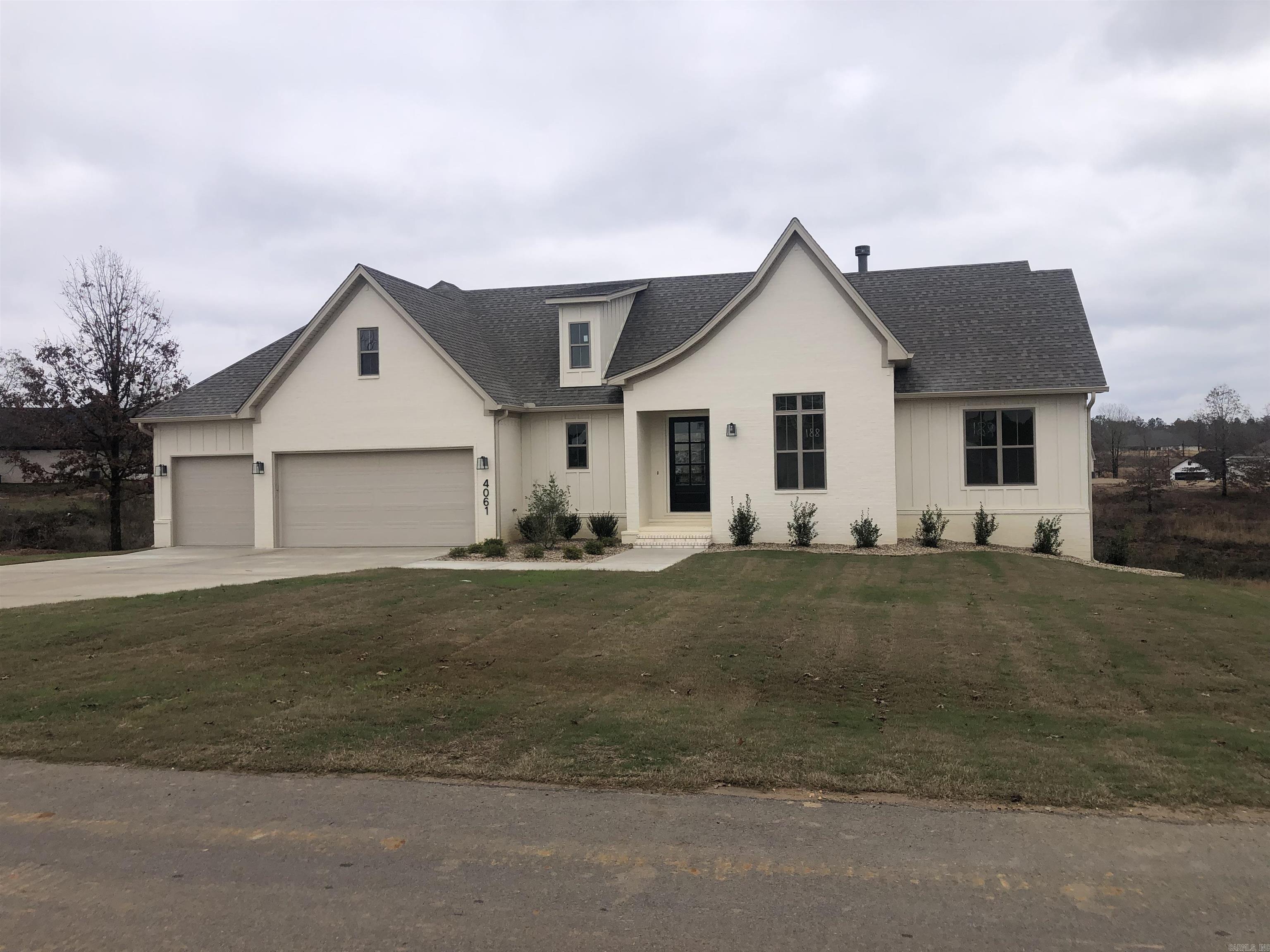 New Construction home - 3 bedroom with office or 4 bedroom. Open floor plan, large covered back porch. 3 car garage! Home also offers finished walk out basement.