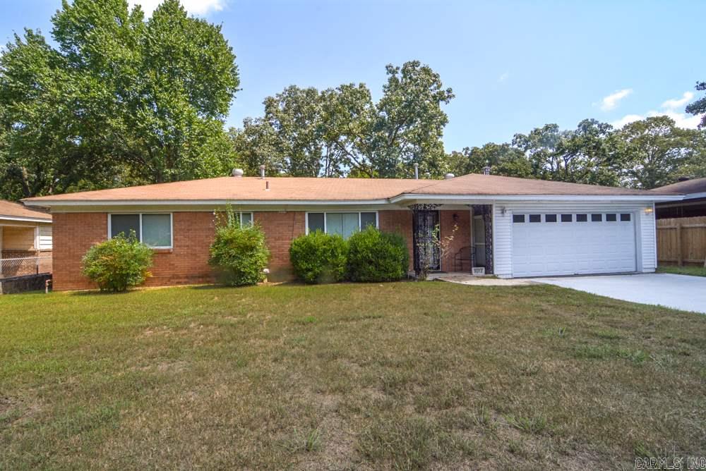 Cute one level home on a nice lot. This home features 3 bedrooms, 1.5 baths and a large kitchen/eat-in area.  Updates include new carpet, fresh paint, wood laminate flooring and new french doors & deck. Kitchen has a gas range, pantry cabinet and lots of counter space.  Large utility room and 2 car garage.  This one is very cute and a must see! Qualifies for Rural Development.