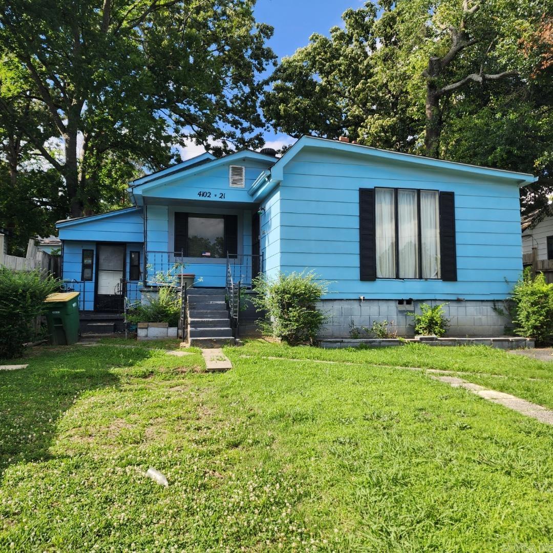 Investors looking for a fix and flip project in an up-and-coming area, this home has great bones and with a little TLC would be the perfect home to add to your portfolio. Features 3 bedrooms, 2 full bathrooms, office space and a storage room with front and back entrance. This home has a large shop/barn with electricity that sits in the backyard. This 1,600 Sq Ft home has great potential and priced below market value. Property is " Sold AS-IS Where is". Call and schedule your private showing today. This one will not last long!! See Agent Remarks.