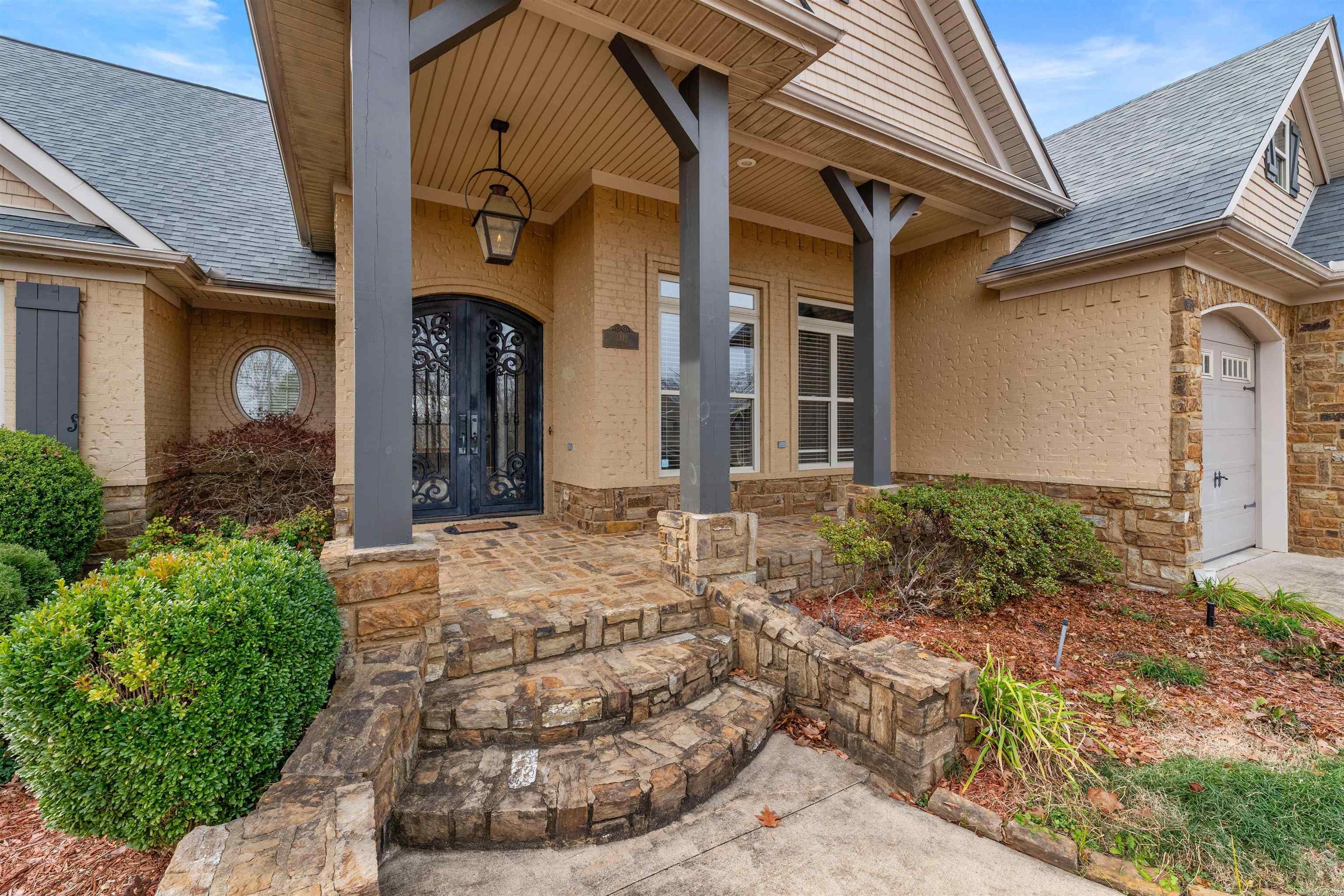 Step into the New Year with this charming single-level home in Woodlands Edge. The grand double iron doors welcome you as you step onto the inviting wood floors. A formal dining room or second living space leads to the kitchen through a butler’s pantry equipped with an ice maker and sink. The kitchen boasts granite countertops, a gas cooktop, and a built-in stove and microwave. A spacious walk-in pantry is around the corner. The eat-in area overlooks the backyard and greenspace. Entertain or relax on the covered back porch with serene views of the greenspace. The primary bedroom features a bathroom with two sinks and a luxurious whirlpool tub. Abundant natural light fills the sizable primary closet. Two additional bedrooms share a bathroom with a separate sink area. The large laundry room offers ample storage and a convenient sink right inside the garage door for easy access. The roof and HVAC are new in 2023.  Enjoy the community amenities of Woodlands Edge, including a pool, walking trails, tennis courts, playground, and clubhouse. This well designed home offers comfort and convenience for a serene lifestyle as you start the New Year.