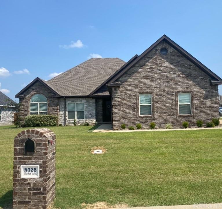 This gorgeous floor plan is 4 bedrooms, 2 bath, boasts 12ft raised ceilings in the great room, kitchen, breakfast area, gas log fireplace located on a corner lot with a 3-car garage. The exterior is covered with all brick and multiple windows surrounding the breakfast area allowing plenty of natural light.  There is a gas log fireplace in the screened in back porch, a grilling pad and saltwater pool.
