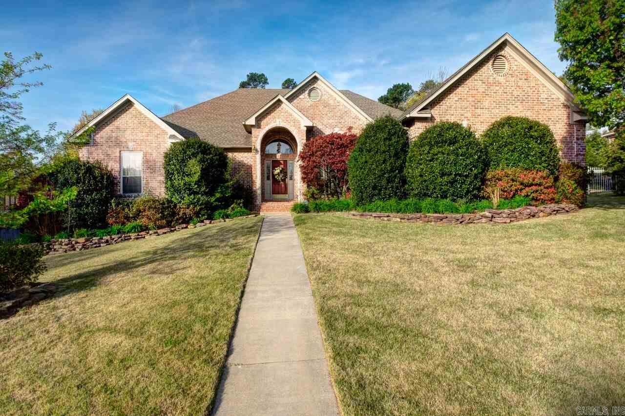 Beautiful one level with a spacious converted 4th bedroom that can be used as a study, library, sitting room or music room.  OR reconverted to a bdrm.  Updated kitchen w/double oven (gas top & electric ovens) and opens to a large breakfast/morning room w/double fireplace.  Long formal dining rm! Large master bdrm, One bay in 3 car garage is finished as an office w/some storage between rm & gar door. Lots of flowering shrubs and flowers in large backyard, walk-in storage underneath. Side loading garage.
