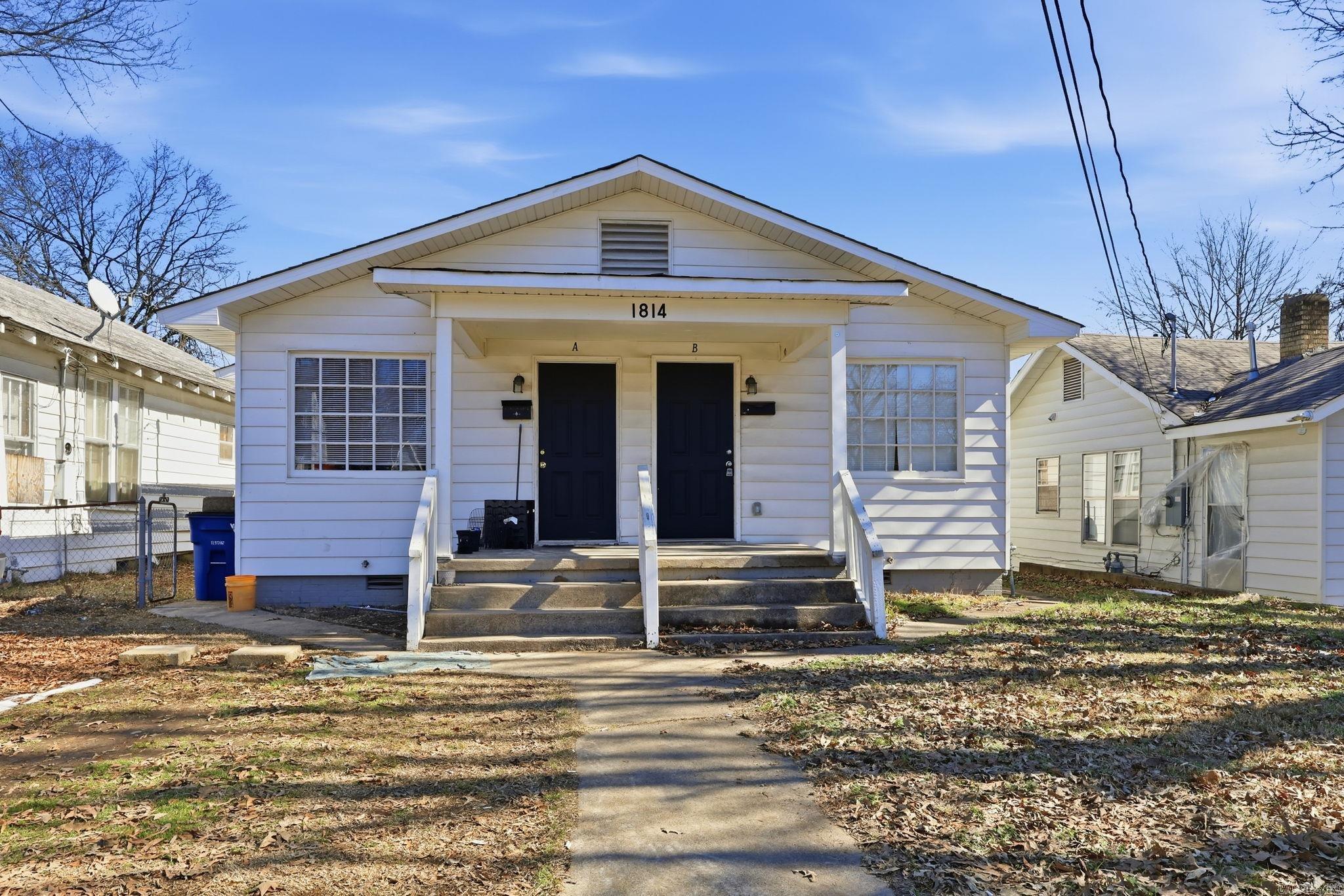 Income-producing duplex opportunity. This 1,594 sq ft duplex features two units, each offering 2 bedrooms and 1 full bathroom, for a total of 4 bedrooms and 2 bathrooms. Both units are currently tenant occupied, offering immediate rental income. Functional layouts and separate living spaces provide flexibility and long-term investment potential. Showings require 24-hour notice and are subject to tenant rights.