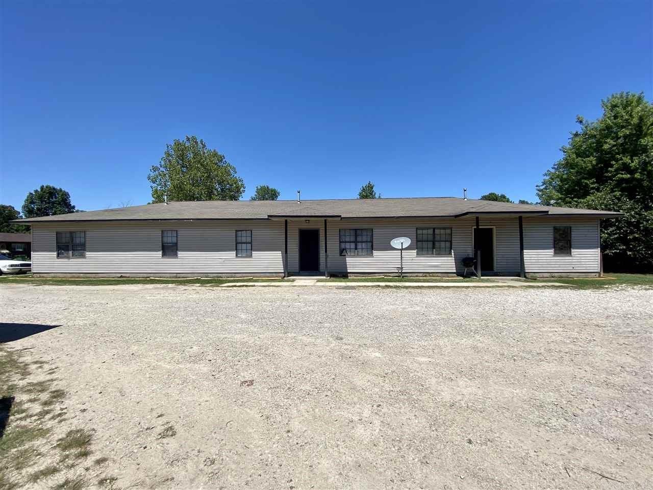 Investors take a look at this 6 unit complex in Hoxie. Maintenance free exterior. Triplex-2bed/1bath. All units 900 sq/ft. Duplex-Unit 1 3bed/1bath, 1110 sq/ft. Unit 2 2bed/1bath., 900 sq/ft. Single unit-1bed/1bath,788 sq/ft. 100% occupied. Call for an appointment.