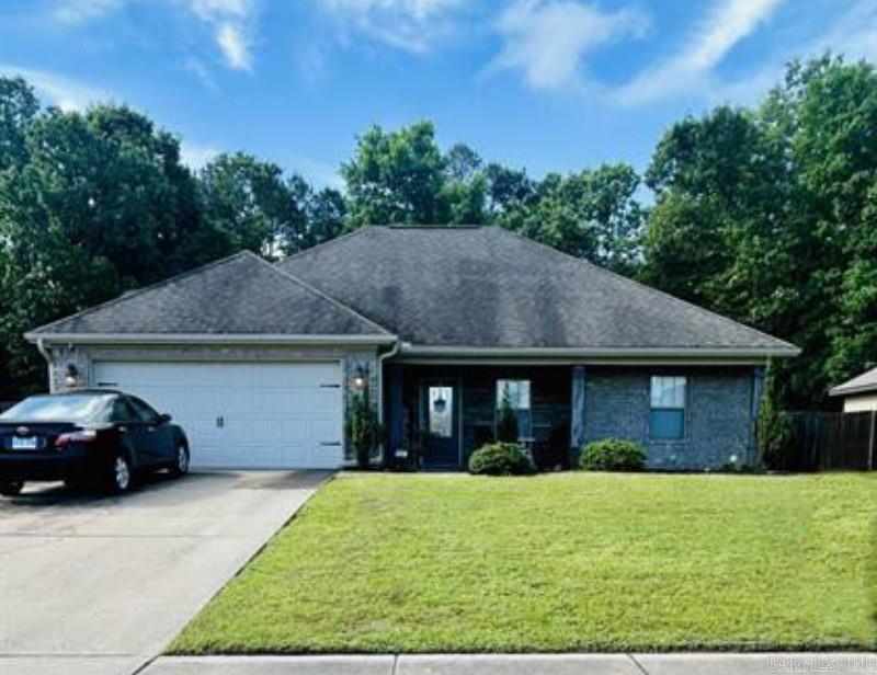Come see this darling home located in a nice desirable subdivision of Redfield, AR.  Home features 3 bedrooms, 2 baths, and an open floor plan.  Large master bedroom includes a wonderful full bath with jacuzzi tub, double vanity's, walk-in shower, and two walk-in closets.  The wonderful kitchen includes a large breakfast bar.  The covered back patio includes a new wood deck, large backyard, and a huge storage building.  Call today to setup your private showing!