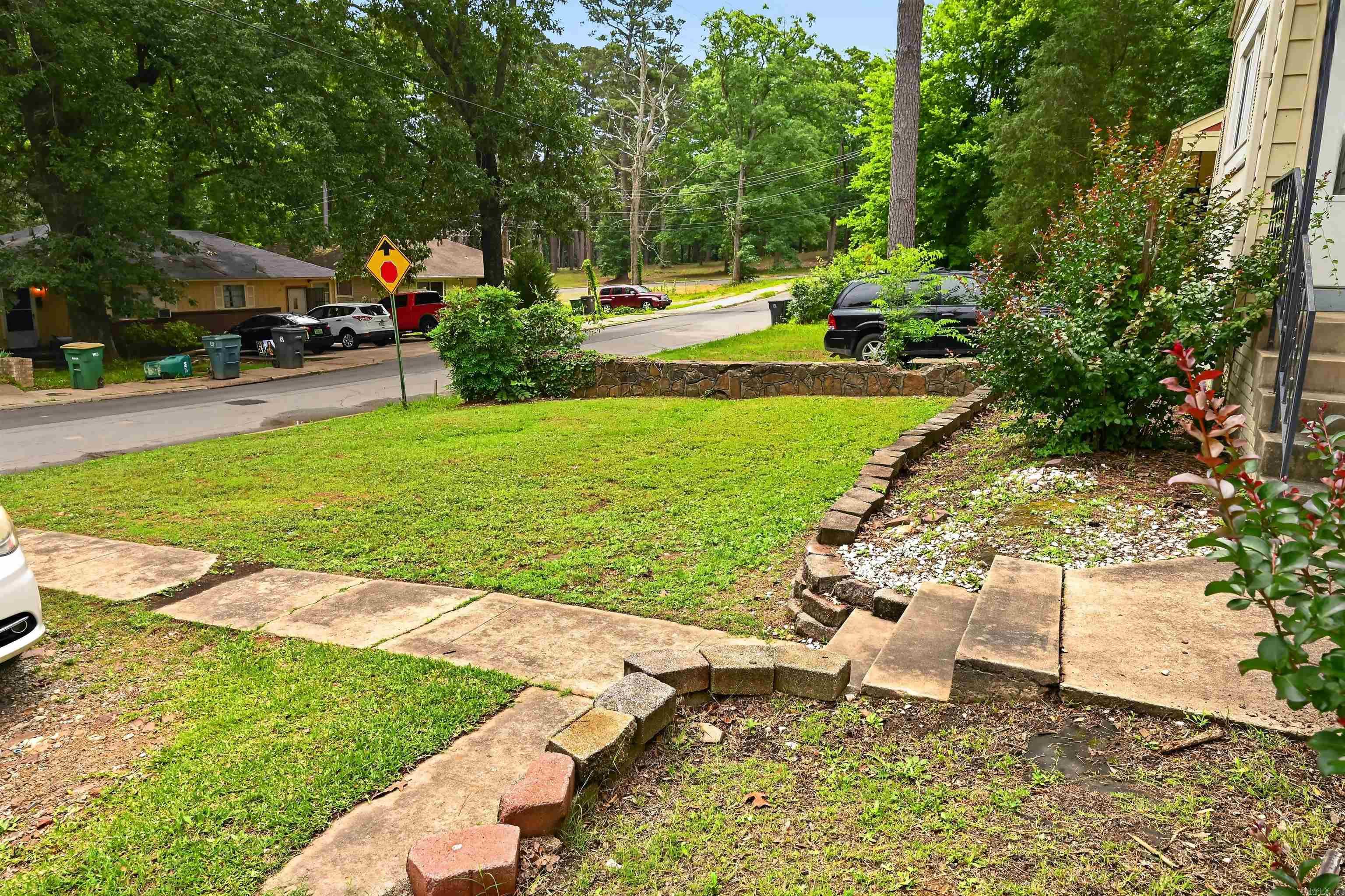 Charming opportunity at 2302 S Harrison St in an established neighborhood of Little Rock. This inviting property offers a functional layout with comfortable living spaces and abundant natural light. The home features well-proportioned bedrooms, a practical kitchen ready for personalization, and a spacious yard ideal for outdoor gatherings, gardening, or future enhancements. Conveniently located near local schools, parks, shopping, and major roadways, providing easy access to downtown amenities. Whether you're a first-time buyer, investor, or looking to customize your next home, this property presents solid potential and value. Don’t miss the chance to make it your own in a growing and accessible area.