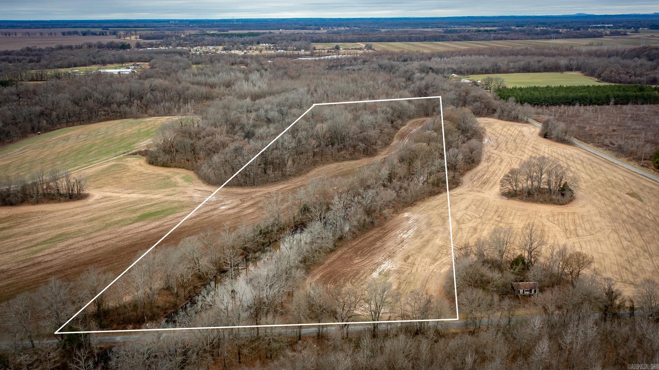 Blank slate for you to create your own homestead, Looking to Build or have land to farm just outside the city limits in Pulaski County? This flat 8.8 acres (approx) is the ticket to paradise no restrictions, accessible to electric. Only limit is your imagination.