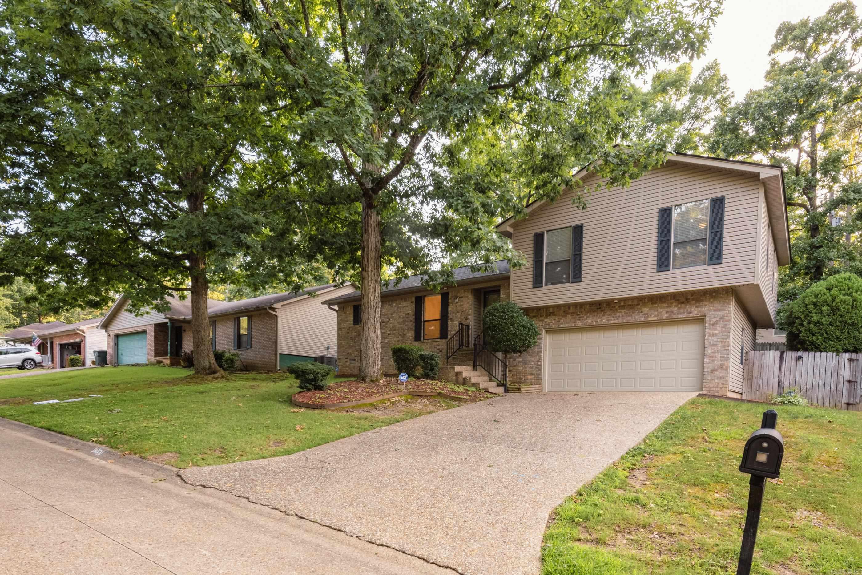 OWNER FINANCING ONLY! If credit challenges have made traditional financing difficult, this may be your path to homeownership. Loan Term Sheet available in the online documents. This beautifully remodeled home features a new roof (2025), HVAC (2020), remodeled kitchen with new stainless appliances (2026), new luxury vinyl plank flooring (2025), and updated lighting throughout. The bright kitchen offers refreshed cabinetry, updated countertops, and a charming bowed window. Enjoy an eat-in kitchen, separate dining room, spacious great room with built-ins and a wood-burning fireplace with gas logs, plus a large primary suite with a walk-in closet and private bath. The oversized back deck is perfect for relaxing or entertaining. Additional upgrades include storm doors, leaf-guard gutters, and generous storage. Conveniently located just minutes from I-430 and I-630, you'll enjoy quick access to downtown, Baptist Health, Arkansas Heart Hospital, Pinnacle Mountain, Two Rivers Park, The Promenade at Chenal, Costco, Trader Joe's, and numerous restaurants, shopping, and entertainment options. NO WHOLESALERS. END BUYERS ONLY. ***See Agent Remarks***