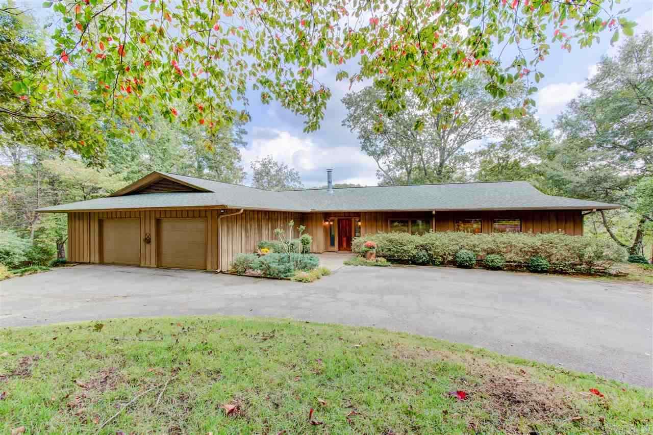 Unique opportunity to purchase 20 +/- very private and beautifully maintained acres in Ferndale with a 1/4 mile of The Little Maumelle river. Custom built one level home with fantastic views of the river and surrounding mountains from the spacious decks or the screened porch. Rolling pastures with large oak trees.  Gated Entry.  Multiple homesites make this perfect for your own very private estate or a place for more than one family. Fabulous large barn and seperate workshop!  PLUS a Whole house generator.