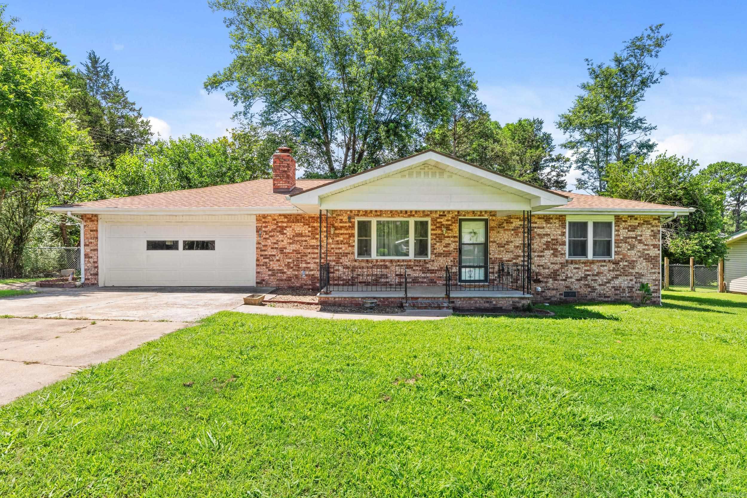 This is one of those homes that doesn’t come around often. Right in the heart of town, it offers the convenience everyone wants plus two additional lots. You’re just minutes from the hospital, shopping, dining, and daily necessities, making life here easy and efficient.  Whether you envision a larger yard, a future build, or an investment opportunity, this property gives you options without sacrificing location. It’s comfortable, well-situated, and full of potential—an in-town home that truly stands apart.  Buyer to verify lot dimensions.
