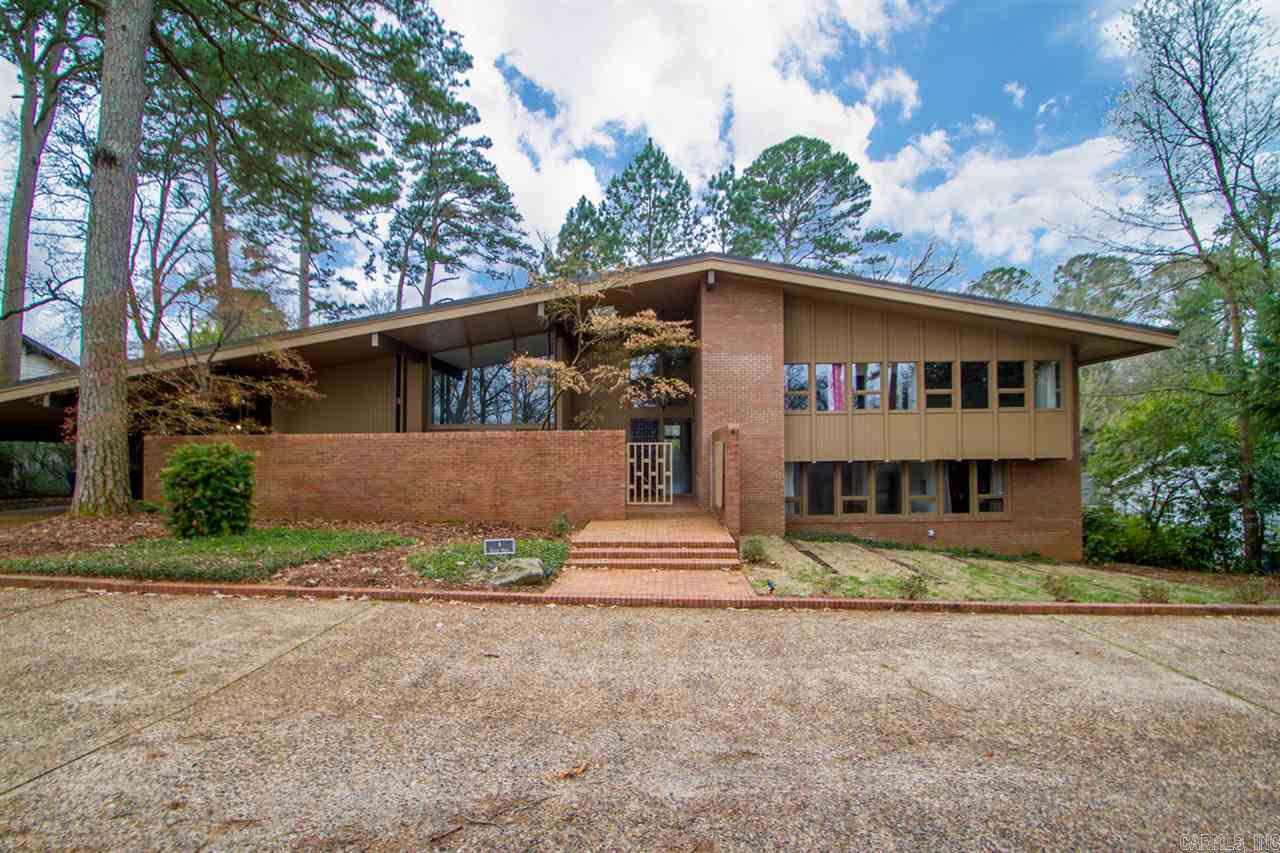 Spectacular Mid-Century home designed by Noland Blass. Beautifully renovated with attention to detail provides a welcome opportunity for family living and entertaining. Natural light highlights the outstanding kitchen and open living space. A luxurious master suite on the main level offers the ultimate privacy. The upper level features an additional master suite, two other bedrooms and an office. The lower level includes two additional bedrooms and a swell bonus space. Desirable outdoor space and parking.