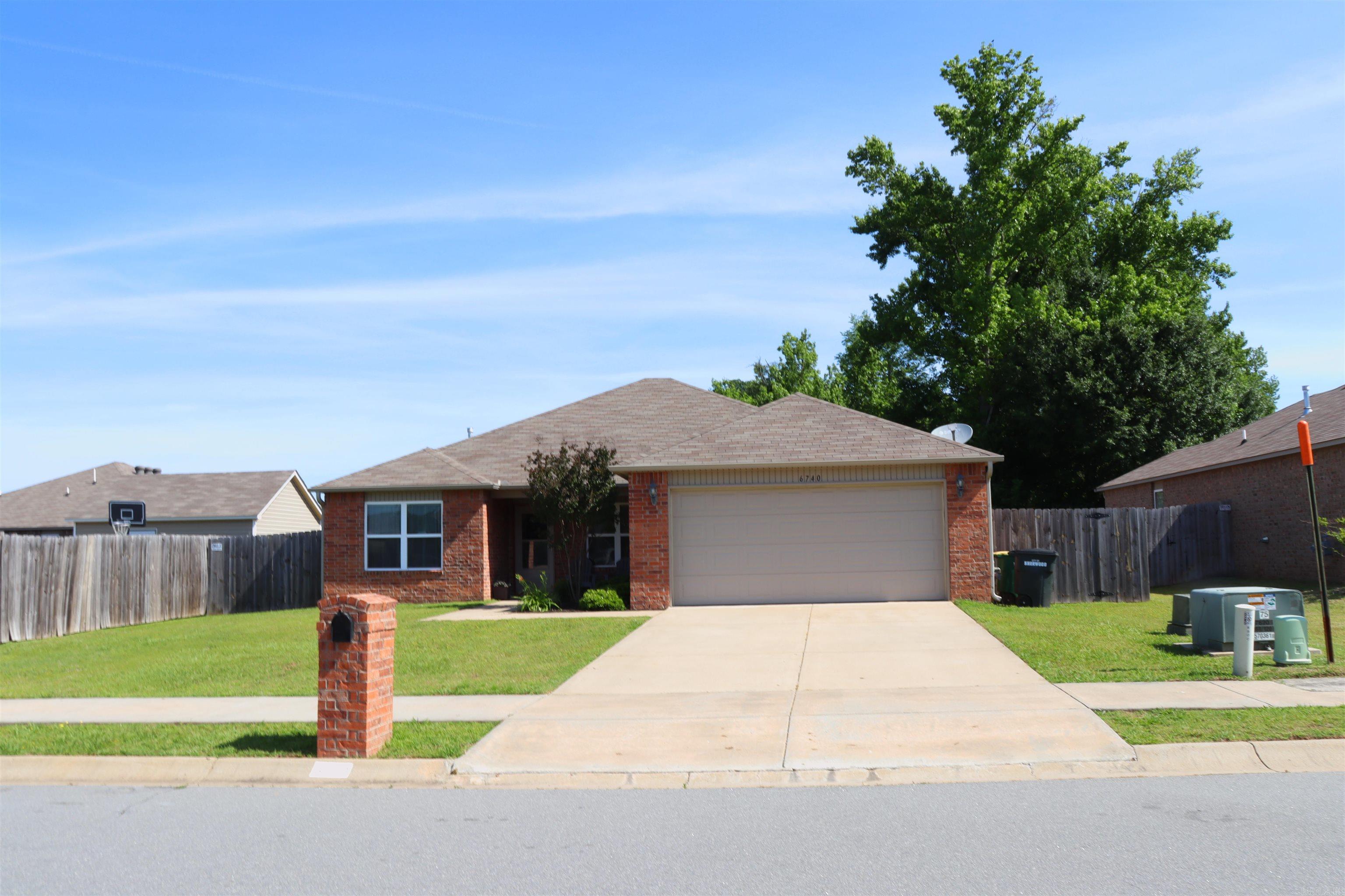 This move-in ready home features a desirable split floor plan and an open-concept layout that is perfect for entertaining. The spacious living room offers recessed lighting and plenty of room to gather with family and friends. The kitchen features beautiful countertops and major appliances. Luxury vinyl flooring runs throughout most of the home, with carpet in the bedrooms for added comfort. Step outside to enjoy the nice-sized backyard and relaxing porch, perfect for morning coffee or evening unwinding. This home is a must see to appreciate and built in 2018.