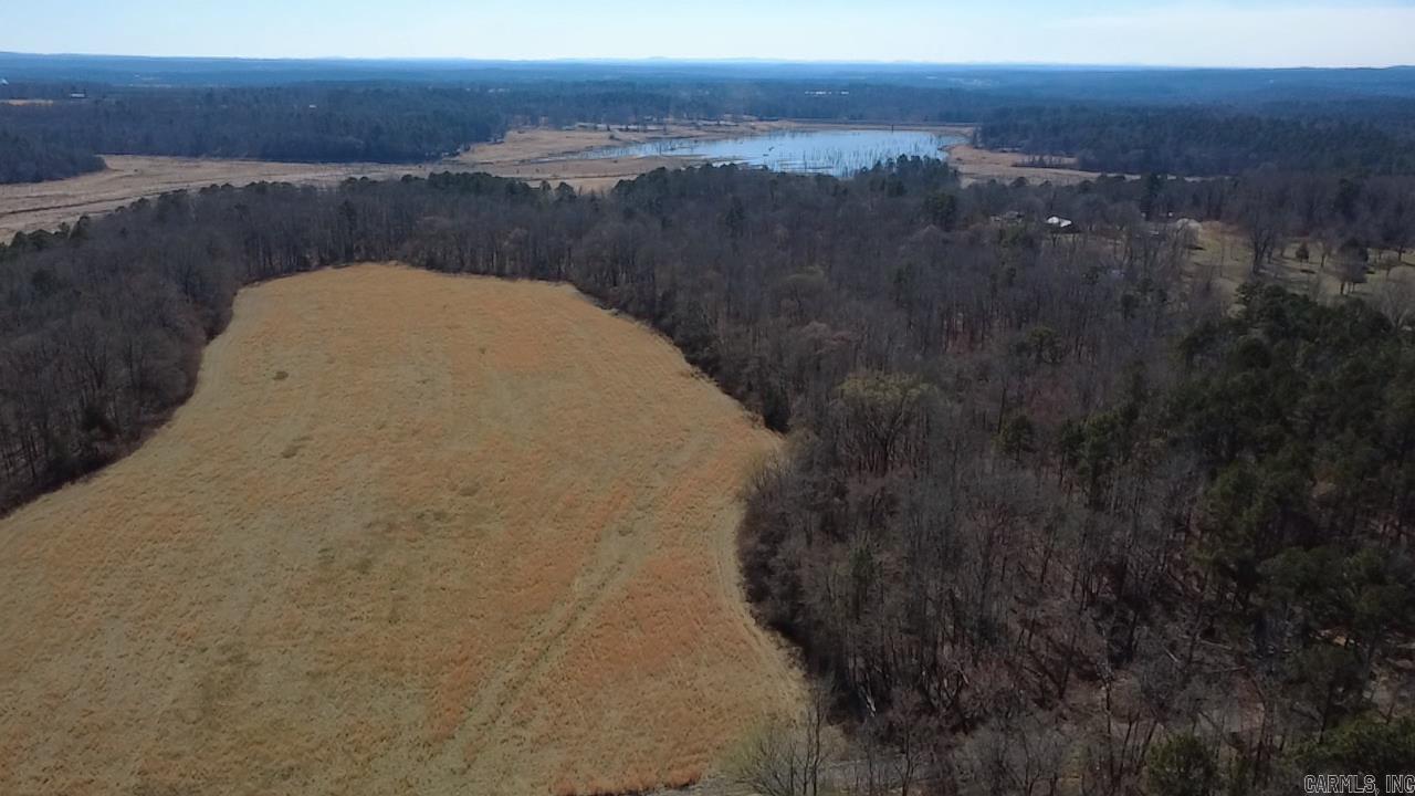 Nice acreage near Lake Wilhelmina with great mountain views. Great build sites, electric and water available. Owner Financing Available.