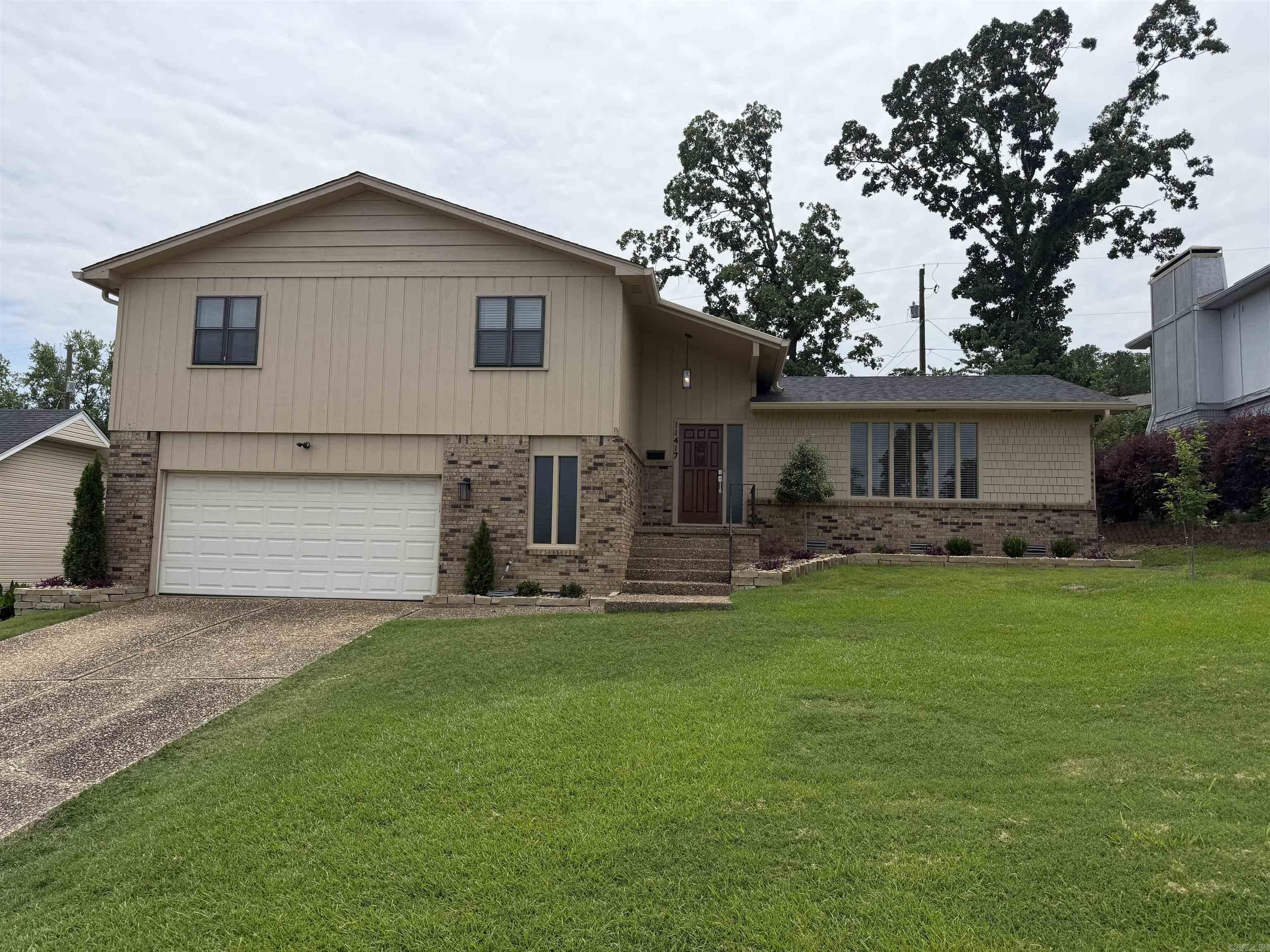 Totally updated Traditional home in the Walnut Valley Subdivision! It features Living Room, Dining Room, Eat-in-Kitchen, Den w/Fireplace, 4 Large Bedrooms, 2 1/2 baths, Separate Laundry Room, 2-Car Double Garage, Deck & Patio! Walking distance to the Walnut Valley Pool & Park!