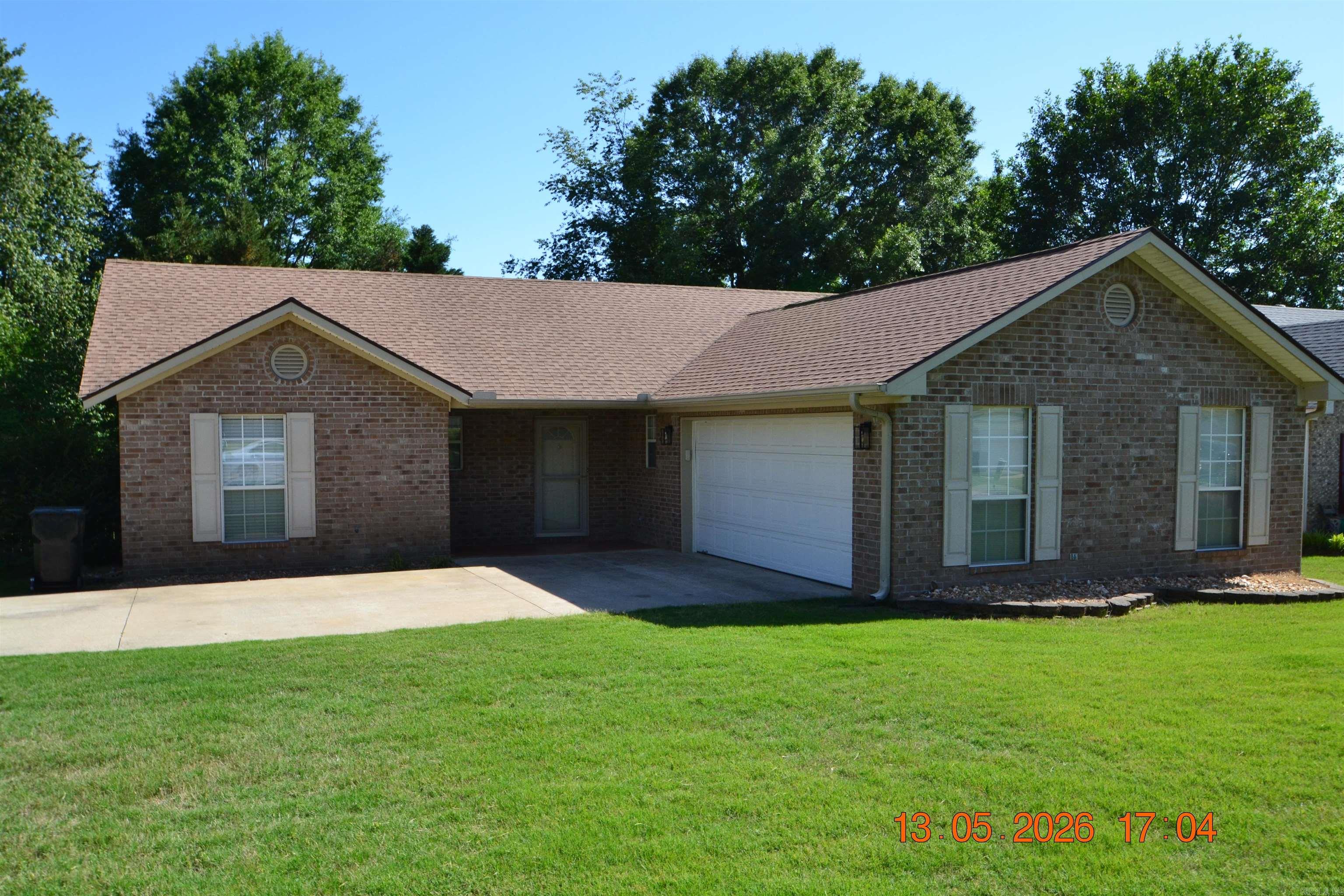 So many updates in this lovely one level home on large corner lot!!! Move in ready in great subdivision. Great room has fireplace, vaulted ceiling and ceiling fan. Lots of cabinets in kitchen where gas range, dishwasher, microwave & refrigerator all replaced 2025. Refrigerator conveys as well as washer & dryer. Primary bedroom has adjoining bath w/shower, jetted tub, double vanity & walk in closet. Enjoy the fenced backyard & the large deck has privacy panels. A double gate allows for easy access to yard, too.     Other updates include kitchen sink faucet (2026), garage door rollers (2025), smoke detectors (2023), garbage disposal (2025), water heater (2023), HVAC system (2025), roof (2021), deck (2020) LVP floors (2013). That's a lot of updates!!!                                                                                                                                                                                                                                                                                                                                                                                  Older refrigerator & TV in garage also convey as is.