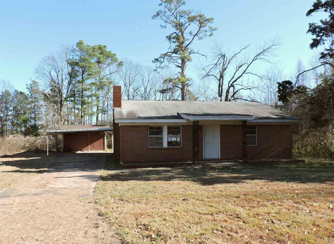 One level brick ranch style home nestled on acreage off Hwy 9 in Leola AR. Home features 2 bedrooms, 1 full bathroom, central heat, central cool, fireplace, open front porch, frame enclosed back porch and a detached two car carport. HUD Case #031-271505, FHA Financing: IE (Insured Escrow), Property is sold in as is condition, no warranties, guarantees or representations about the property.