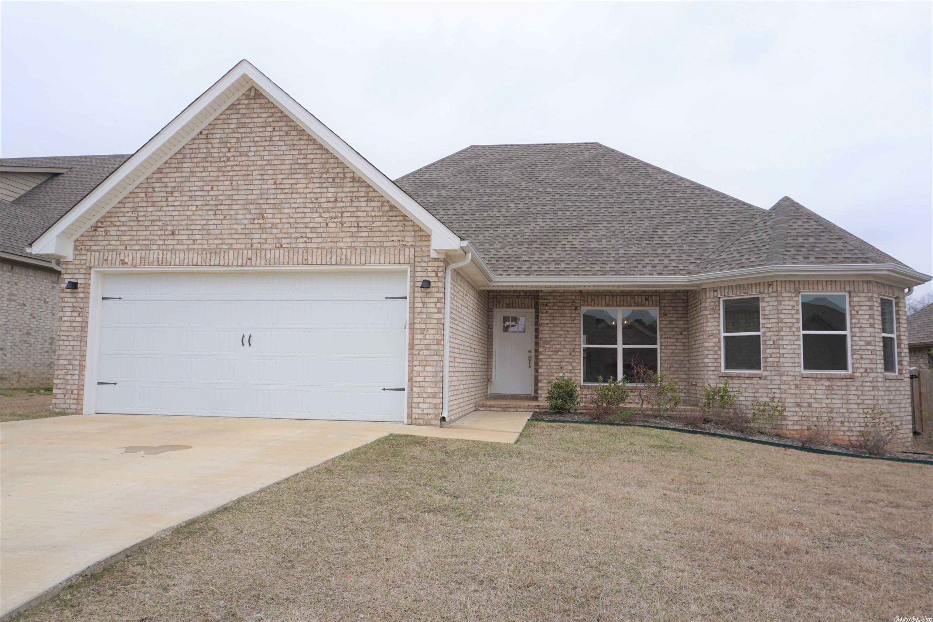 This well-maintained home is in the heart of Jonesboro and a short drive from Hilltop Jonesboro and NEA Baptist Hospital. This home has an open concept floor plan that features a spacious living and dining space with a gas fireplace and luxury laminate flooring. Kitchen features rustic wood cabinets, quartz countertops, island, and all stainless steel appliances. Large master suite with coffered ceiling and spacious walk in closet with ensuite. Master ensuite features double vanity, tile glass shower, and soaker tub. Right off of the garage entrance is a mudroom with built-in storage and laundry room. The backyard retreat features a large patio/deck and spacious yard surrounded by a wood privacy fence. This home is in the center of the Nettleton School district, and minutes from University Heights Elementary. Don’t miss your opportunity to see what Pecan Acres subdivision has to offer!