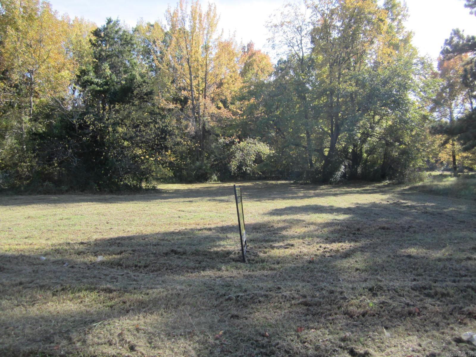 Prime Development Opportunity: 4.7± Wooded Acres in Little Rock. Opportunity  meets location with this exceptional wooded tract inside Little Rock city limits.  Positioned at the corner of Simpson Street and Milburn Lane, minutes from  downtown, less than 3 miles from Clinton National Airport, ~1 mile from I-440  (Exit 1). Build a private estate with room to breathe, or use dual-road frontage  on Simpson St. and Milburn Lane to subdivide into 4 to 5 estate-sized lots. Zoning:  R-2 (min. lot 7,000 sq. ft., 60' frontage, 100' depth). City utilities at roadside.  OWNER FINANCING: 30% down ($29,970), up to 10-yr term, flexible payments, all terms are negotiable. Buyer to verify all intended uses, zoning compliance, and  utility access points.
