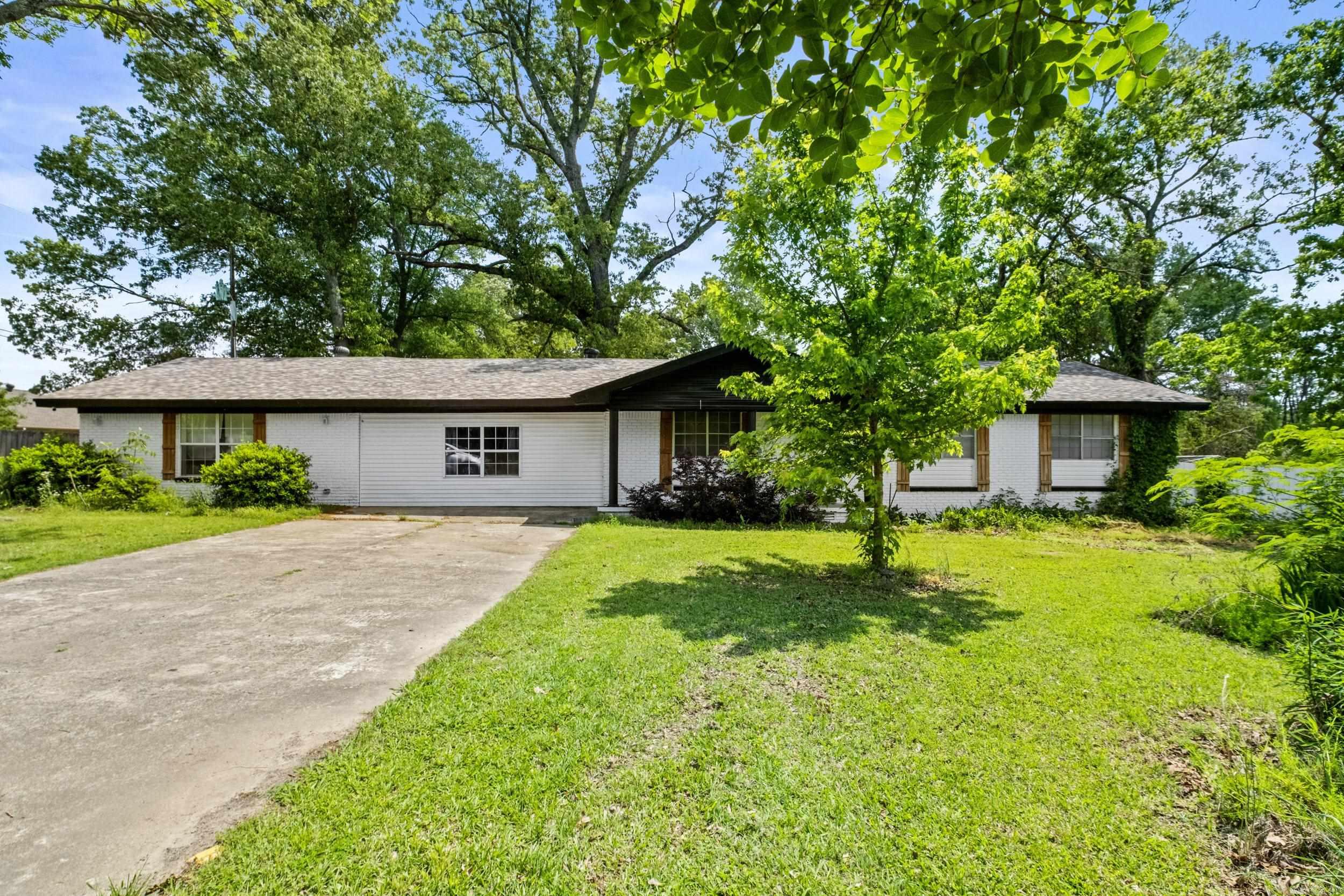 This charming ranch-style home offers 2,249 sqft  of spacious living space, featuring four bedrooms and two bathrooms. set on a nearly 1-acre lot (.97 acres), this home is perfect for those seeking both comfort and space. With an open floor plan, the living areas seamlessly flow, creating an ideal setting for entertaining. The home boasts freshly painted walls, new cabinets, and new stainless-steel appliances (2023), along with stunning granite countertops and flooring that bring a modern touch throughout. Enjoy peace of mind with a new HVAC system and roof, both replaced in 2023. Spacious bedrooms and a generously sized laundry room add to the home's appeal, while the fully fenced backyard provides privacy and ample room for outdoor activities. Located in a quiet neighborhood, this home is move in ready and waiting for you to make it your own!