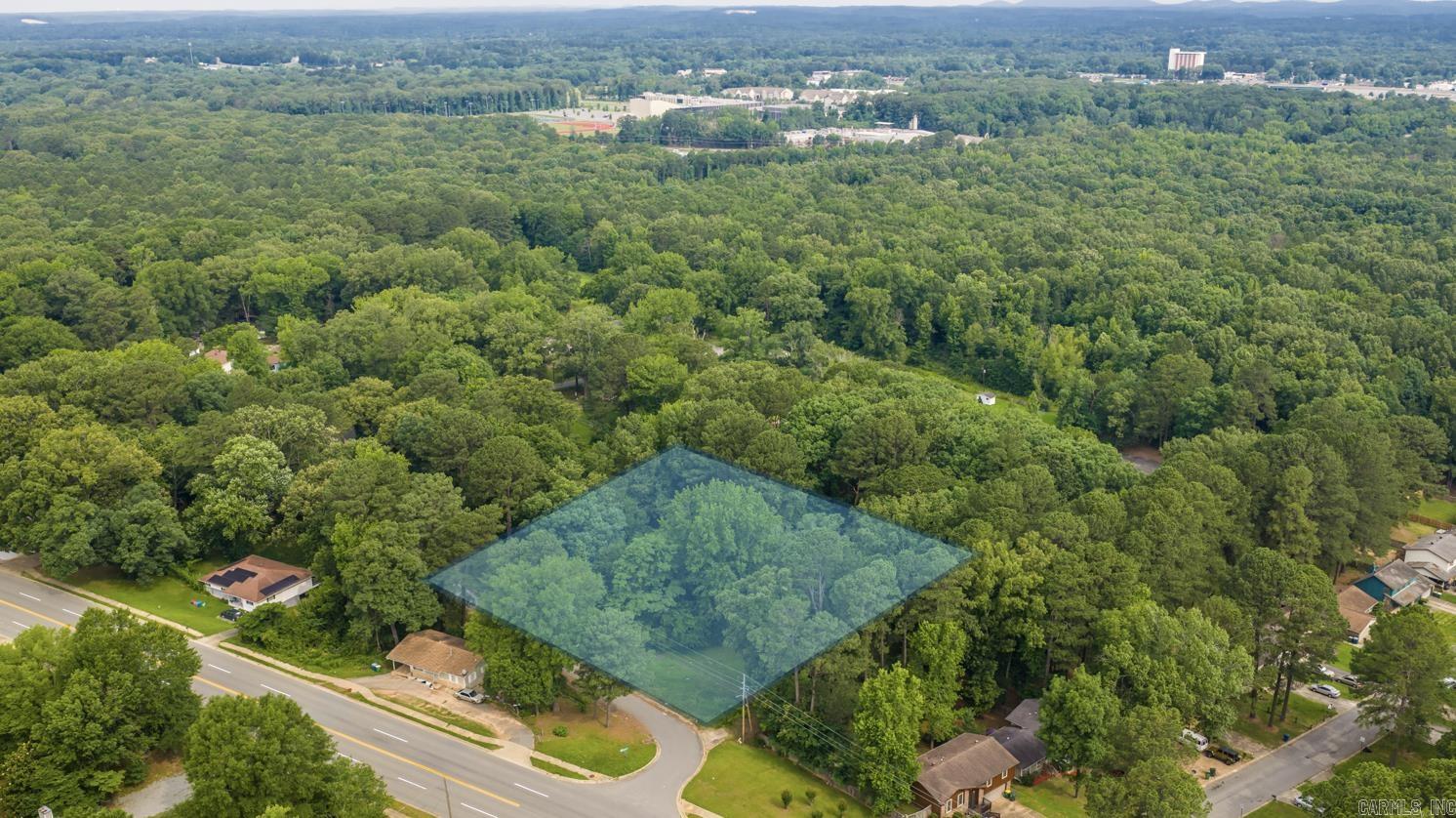 Beautiful 2-Acre Residential Lot in a Convenient Mabelvale Location! Build your dream home on this spacious 2-acre parcel offering the perfect blend of privacy and convenience. Located on University Road, this property provides ample space for a custom home, outdoor living areas, and more. Enjoy a peaceful setting with mature trees and room to spread out while remaining just minutes from shopping, dining, schools, and easy access to I-430. Whether you’re looking to build now or invest for the future, this versatile property offers endless possibilities. Come explore the potential and make this property your own!
