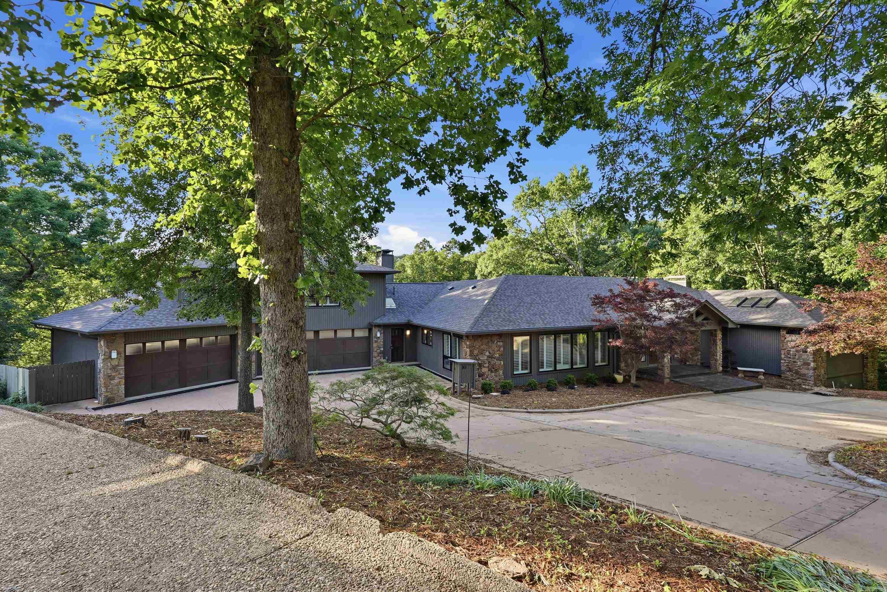 Elegant estate on 7.25 acres in the highly desirable Robinwood neighborhood. This beautifully updated home features 5 bedrooms with walk-in closets, 5 full baths, and 2 half baths, plus a separate fully equipped apartment above the garage, bringing the total to 6 bedrooms and 6 full bathrooms. A stunning wall of windows fills the space with natural light. Recent upgrades include a brand-new roof, two new HVAC units, whole-house generator, all new flooring, fresh paint, and LED lighting throughout. Designed for both living and entertaining, enjoy a spacious downstairs entertainment room with kitchenette, plus a dedicated home gym. The property also includes a private basketball court and gorgeous, expansive grounds. The apartment includes a full kitchen, bedroom, bathroom, and walk-in closet, ideal for guests, in laws, or teenagers! Luxury, space, and versatility all in one exceptional property and located in a beautiful cul de sac. Message for details or a private showing