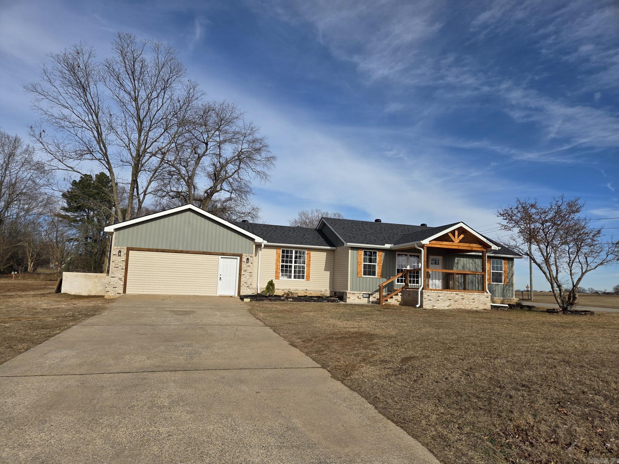 Remodeled & added onto 4-bedroom, 3 baths all electric house with extra movie/game room just outside Searcy city limits! All new plumbing, electrical, HVAC, water heater, cabinets, flooring, stainless appliances, granite counter-tops, roof & more on a 1/2-acre lot. This house also has a storm shelter accessed from inside, separate laundry, covered front porch with wood beams & lots of space. Master bath has a barn door, a custom walk-in shower with glass panels & door & dual sinks. The kitchen has tile backsplash, granite countertops, pantry, island with bar, sink & dishwasher. A pot filler has been added above the stove. NO carpet! Great layout for large or extended family with bedrooms & baths on 3 sides. See agent remarks.