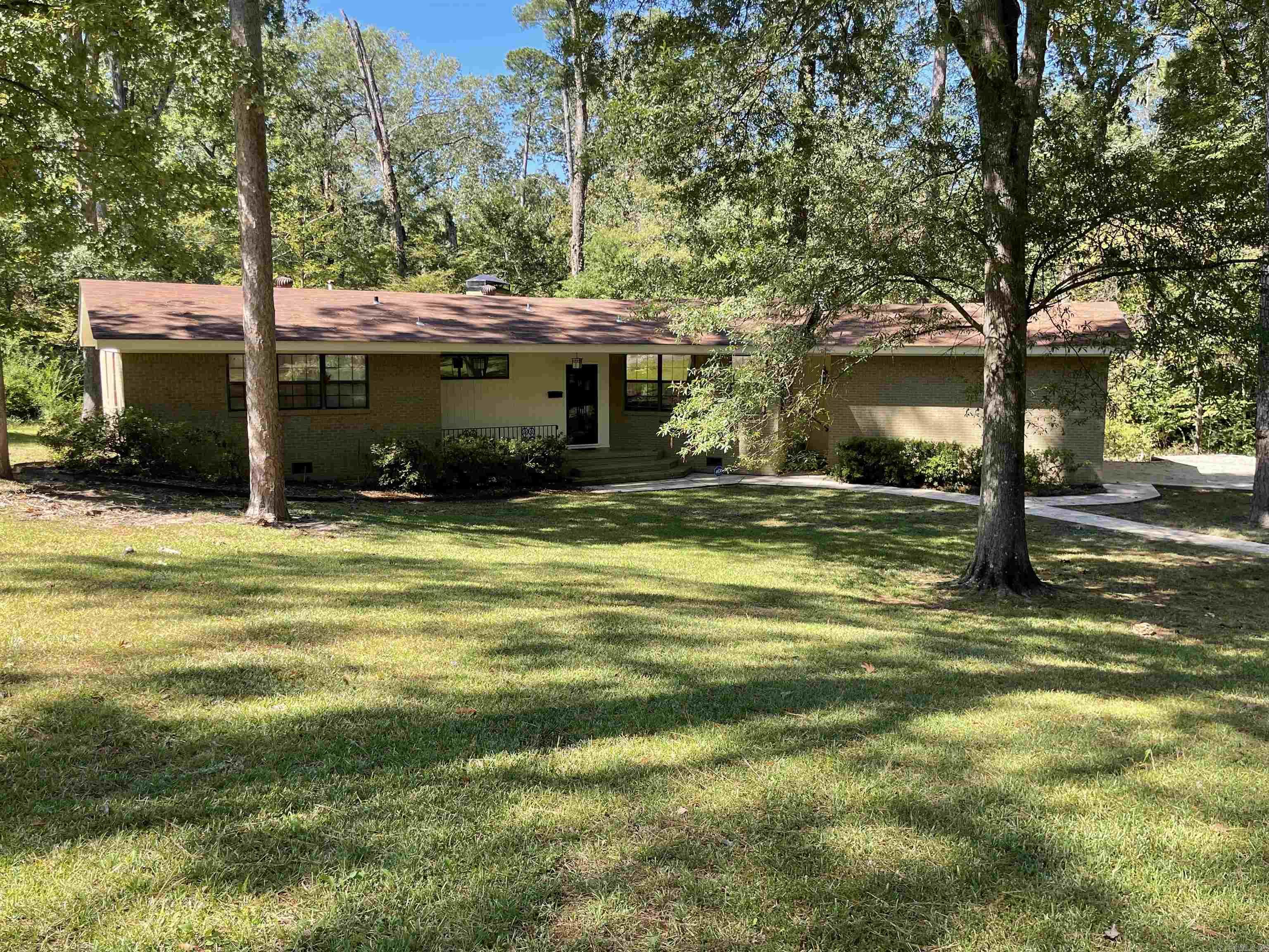 Located in the desirable Northeast section of El Dorado, this Mid-Century Modern home has 2 new HVAC systems, new roof, appliances have all been replaced and will remain.  Deck has been replaced.  New lighting and fans.  New blinds.  Hardwood floors.