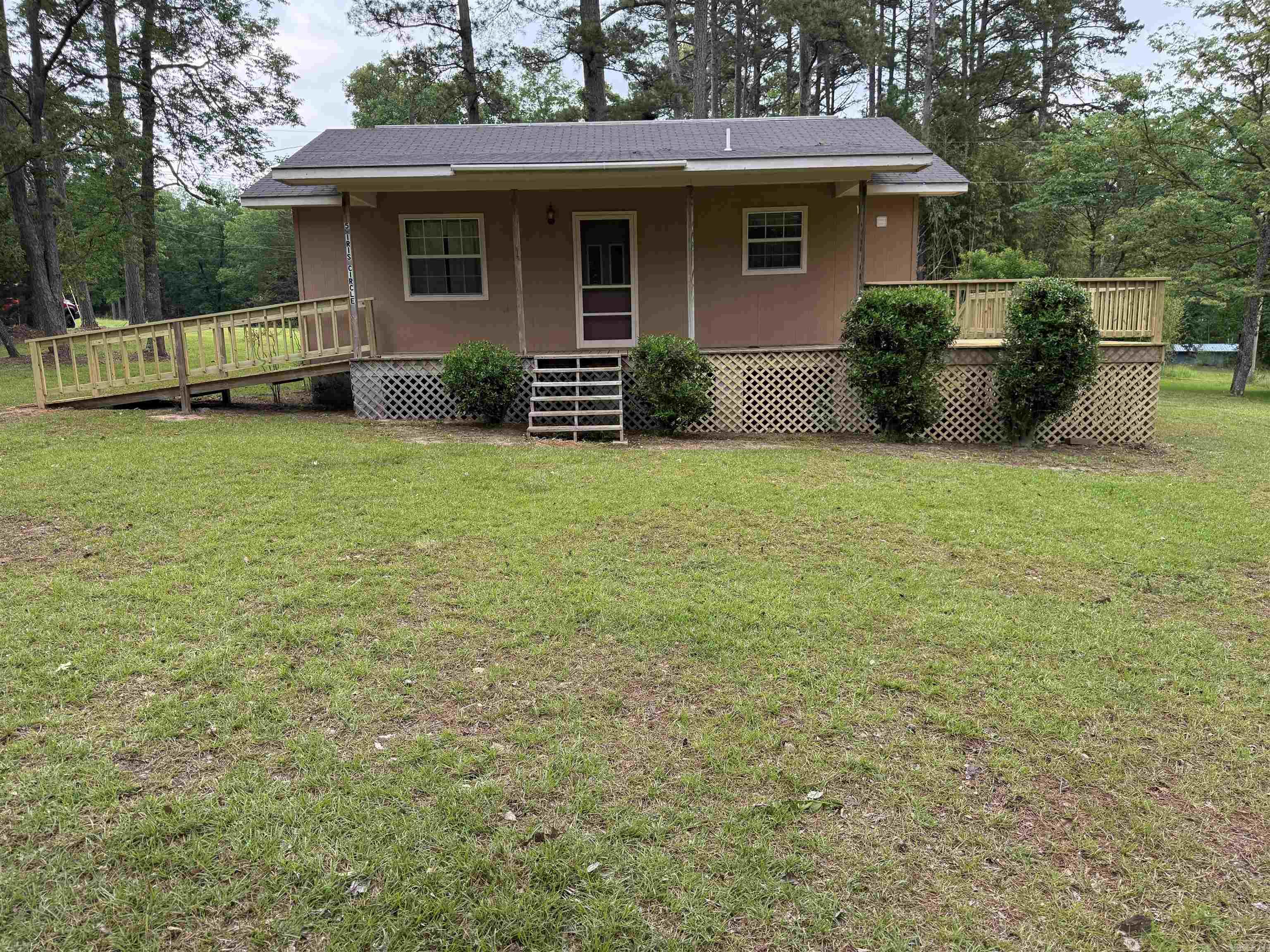 Perfect lake getaway or full-time retreat near beautiful Greers Ferry Lake! This charming 2 bedroom, 1 bathroom home offers the ideal blend of comfort, convenience, and lake-life living. Enjoy relaxing mornings and evenings on the brand-new front and side decks, complete with a ramp for easy access into the home. A standout feature of the property is the impressive 30x50 drive-thru shop — perfect for storing boats, jet skis, ATVs, fishing gear, and all your lake toys with room to spare. Located just minutes from a community boat ramp and swimming area, you’ll have quick access to everything Greers Ferry Lake has to offer. This home has a new well pump and new lines that run from the pressure tank to the well, Roof in 2008 the window unit has heat and cool 5 to 7 years, Hot water tank and 2012. Whether you’re looking for a weekend escape, vacation rental opportunity, or a peaceful place to call home, this property is ready for lake adventures year-round!