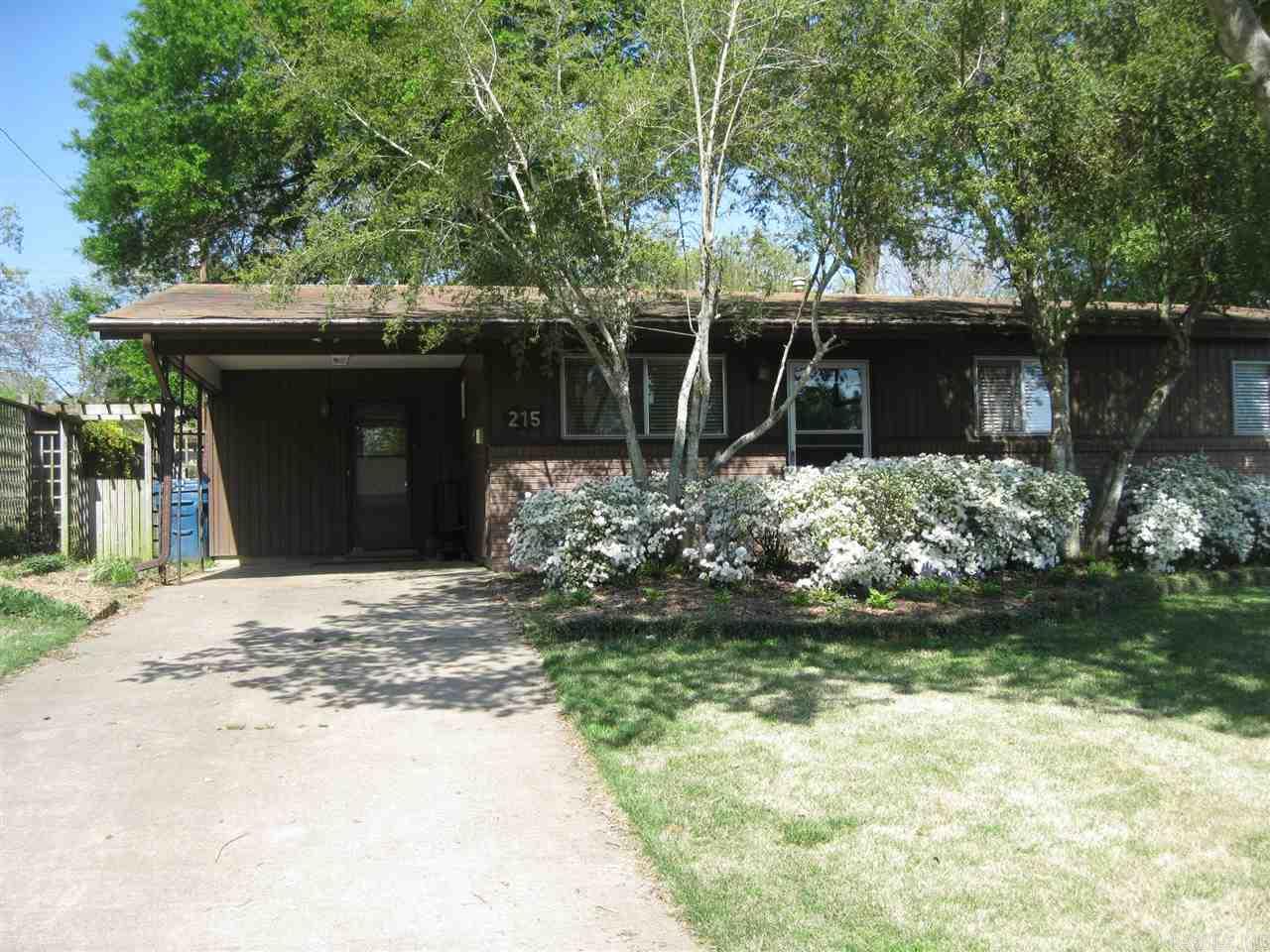 Convenient WLR location!!  1 level brick and siding home with level fenced yard with a covered deck.  Approx. 1361 SF. 3 bedrooms. 1 full bath.  Living room plus a large den with vaulted ceiling, skylights and fireplace. Den opens to Kitchen and eat-in area. Utility room.  Laminate floors in living areas. NEW Carpet in bedrooms. Roof replaced in 2015. Sewer line replaced in fall 2014.