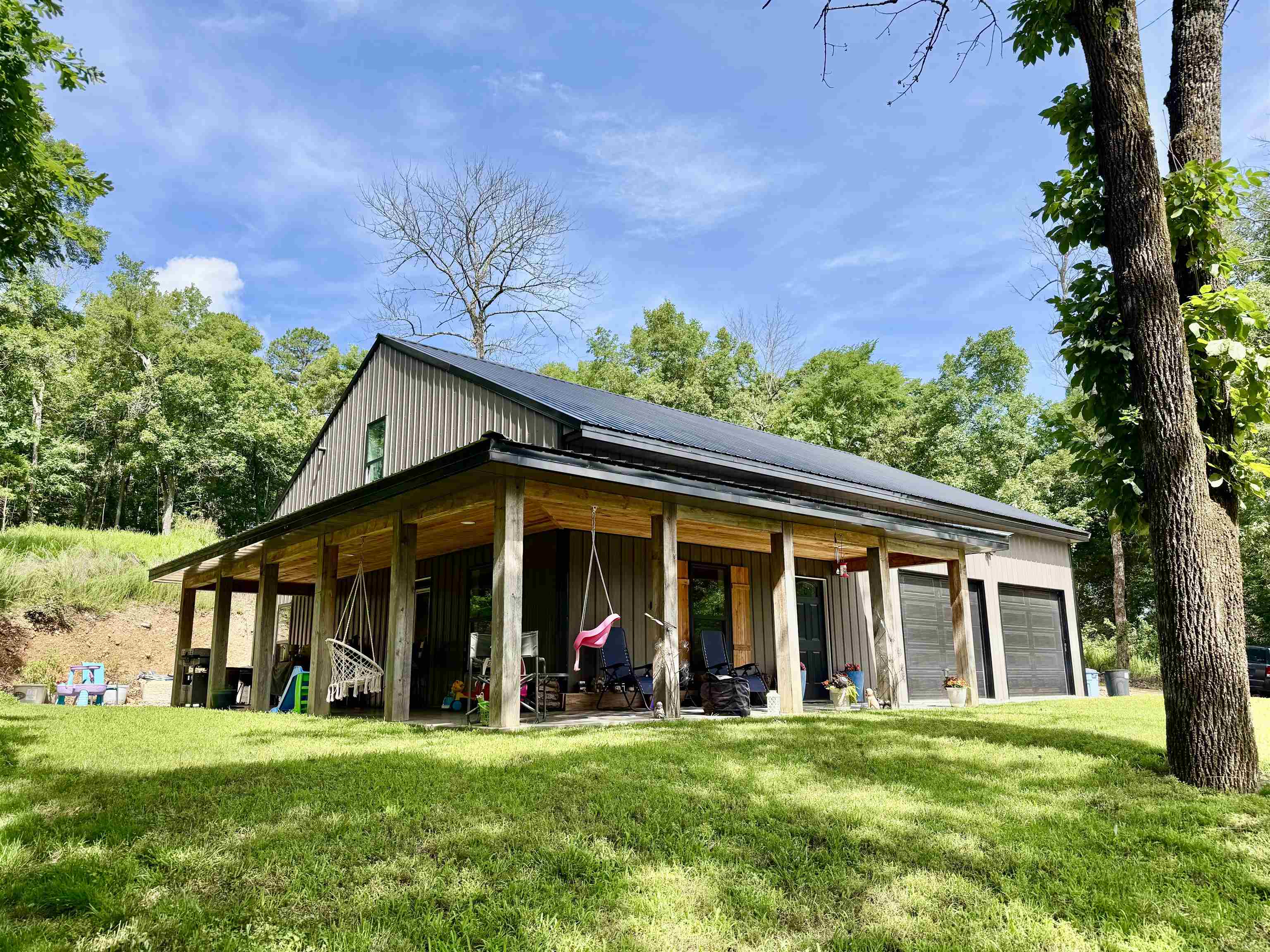 Check out this beautiful 3-bedroom, 2.5-bath home sitting on 2 acres just off Scenic Hwy 9 and only minutes from the White River! This well-designed home features an open floor plan with a spacious living room flowing into the kitchen, complete with a large island, pantry, and stainless steel appliances.  The main-level master suite offers a walk-in closet and a private bathroom with a walk-in tile shower. Upstairs you’ll find two oversized bedrooms, a full bathroom, and a versatile open area perfect for a playroom, office, or sitting area.  The fully finished lower level includes a large garage, storage space, half bath, laundry area, and mechanical room. Designed with future flexibility in mind, this space could easily be converted into additional living quarters if desired.  Enjoy country living on 2 acres with easy access to outdoor recreation, fishing, and all the beauty the White River area has to offer!