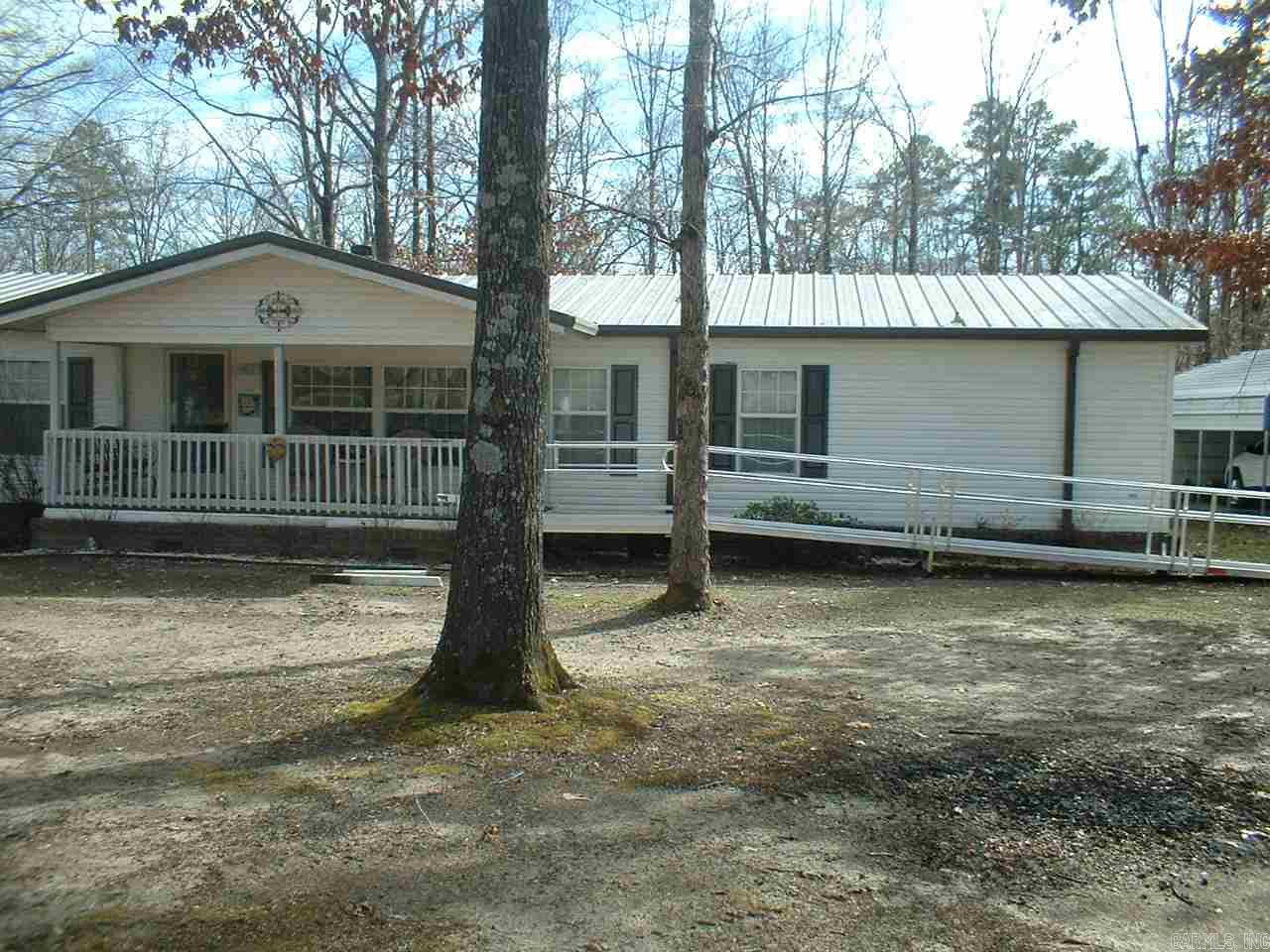 TRIPLE WIDE MOBIL HOME ON 3.8 ACRES LIKE NEW CONDITION.