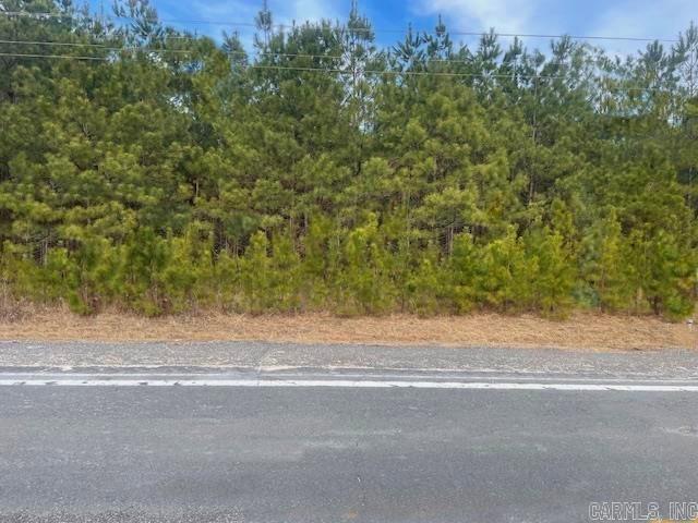 7.97 wooded acres with frontage on Hwy 35 north. Very nice area, close to farms and also upscale housing development.