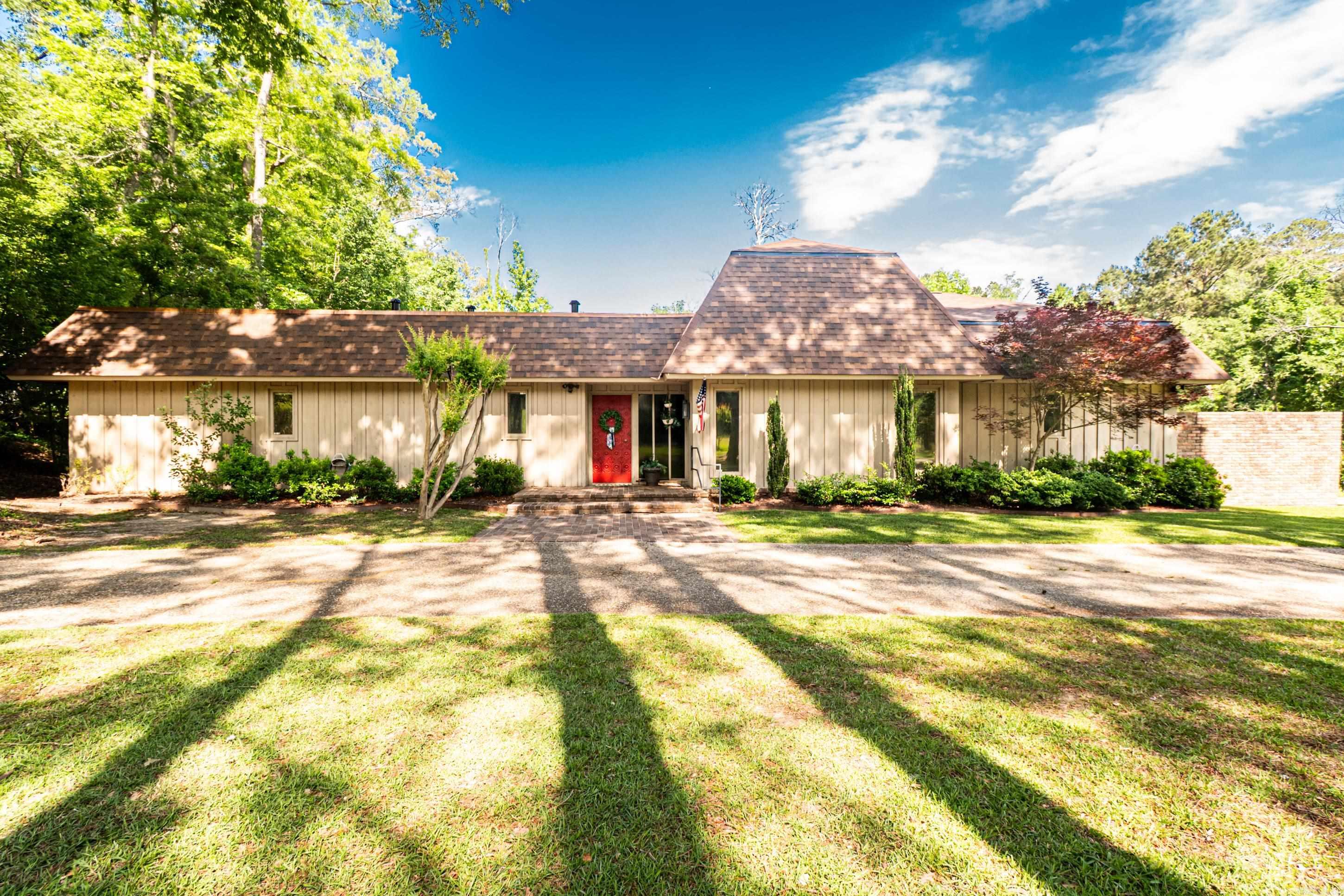 Lovely mid-century modern home located in the desirable Country Club Colony subdivision. This spacious 4-bedroom, 3.5-bath home offers two generous living areas, providing plenty of space for a large family, entertaining, or relaxing. The home features beautiful architectural character, abundant natural light, and a functional layout throughout.  Recent updates include a new roof (2025), new refrigerator and dishwasher, enclosed hallway to the garage apartment, enclosed upstairs loft to create an additional bedroom, new interior paint, new lighting throughout, new cabinets in the primary bedroom, and a built-in sauna for added comfort and relaxation. Exterior improvements include new landscaping, a new fence, and an updated deck area perfect for outdoor entertaining.  Situated on a spacious 0.61-acre lot, this property offers a rare combination of style, comfort, and modern updates in one of the area’s most desirable neighborhoods.