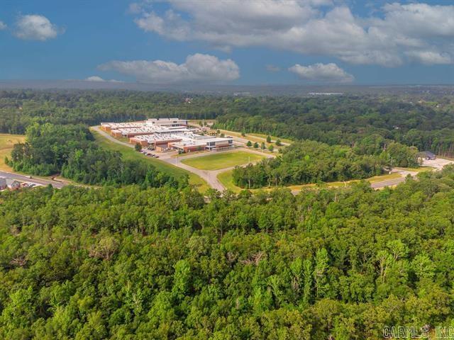 Beautiful 1.55 Acre lot in the heart of Sherwood to build your dream home!!! This lot is surrounded by an established subdivision, tons of shopping, great schools and is a perfect location to call home. Lot 3 is 9924 Johnson Dr
