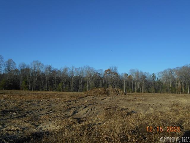 Property narrow but deep in layout. Wet weather creek toward back. Front half has been grubbed and ready for a house. Has been prelim perked (letter in documents) Restricted to houses with mininum square footage of 1000 sf. (deed restrictions in documents) Sardis Water available at road, Electricity at road, Windstream/Go Kinetic fiber internet and gas is to the east and might be able to be extended....would need to contact Summit Utilities.