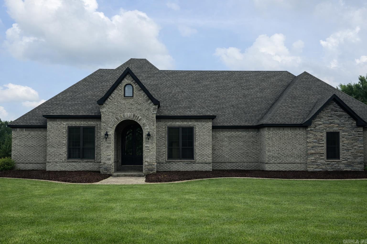 Beautiful custom built home sitting on 24 acres in Cross County just outside the city limits.  Be minutes from town, but also have the peace and quiet of country living.  This gorgeous home has all the features that you could ever want. Space for the entire family and then some.  Each bedroom has its own walk-in closet and private bathroom.  The primary bedroom and bathroom is something to be seen.  Your own private oasis of relaxation just waiting to be enjoyed after a long day.  Come take a look at this stunning property today