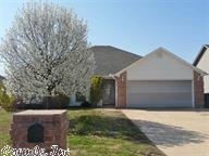 Great home in a great neighborhood. This 4 bed/2 Bath home features a split floor plan, large bedrooms, and a large laundry room equipped w/ washer/dryer and extra shelving for pantry storage. The back yard is a perfect size for kids, pets or entertaining and includes a storage bldg. Master bath has dual vanities, his/hers closets, jet tub, and stand up shower. Living room has a built in home entertainment system in the wall that is ready for your speakers.  Price is great for a 4 bedroom home of this size