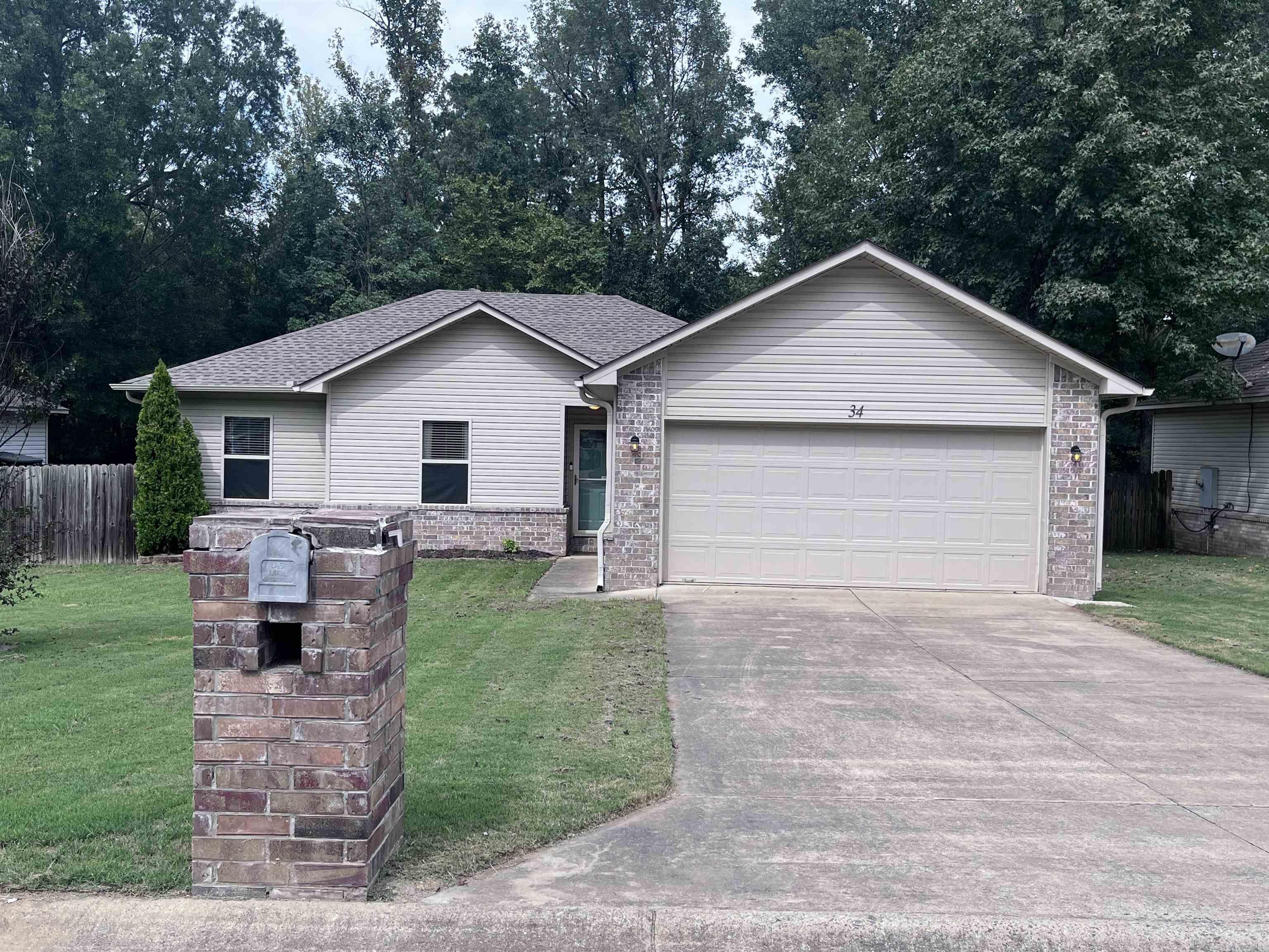 Cute 3 bedroom, 2 bathroom home in the Cabot School District AND only 2 minutes from the interstate for quick commute to LRAFB or Searcy! Screen-in glass storm door and large double windows allow for tons of natural light. High ceilings, luxury vinyl plank flooring, modern fixtures and a separate laundry room. Kitchen boasts wood-stained cabinets, a large eat-in area and an island bar for extra seating. The privacy fenced backyard and large deck are perfect for entertaining or even a quiet night watching the birds and sunset through the backyard tree line. This house is ideal for anyone wanting to be close to everything, but away from the noise. Reach out for your personal showing! Locally managed by Edge Realty-Cabot.