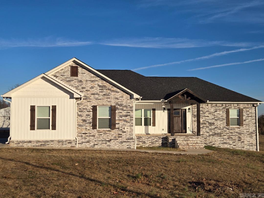 This gorgeous home, built in 2023, offers modern design and peaceful country living on over 3 acres. Featuring 4 bedrooms and 2 full bathrooms, the home showcases quality craftsmanship throughout, including ceramic tile flooring and elegant granite countertops in both the kitchen and bathrooms. The spa-like primary bath includes a beautiful free-standing soaking tub for ultimate relaxation. Also has a large safe room. Eye-catching 8x8 cedar posts add warmth and character to the exterior. Enjoy ample space for vehicles and projects with a 2-car garage plus a 24x25 shop.  Approximately 2672 sqft under roof, 1850 heated and cooled living space. A rare combination of style, space, and serenity—this property is truly a must-see.