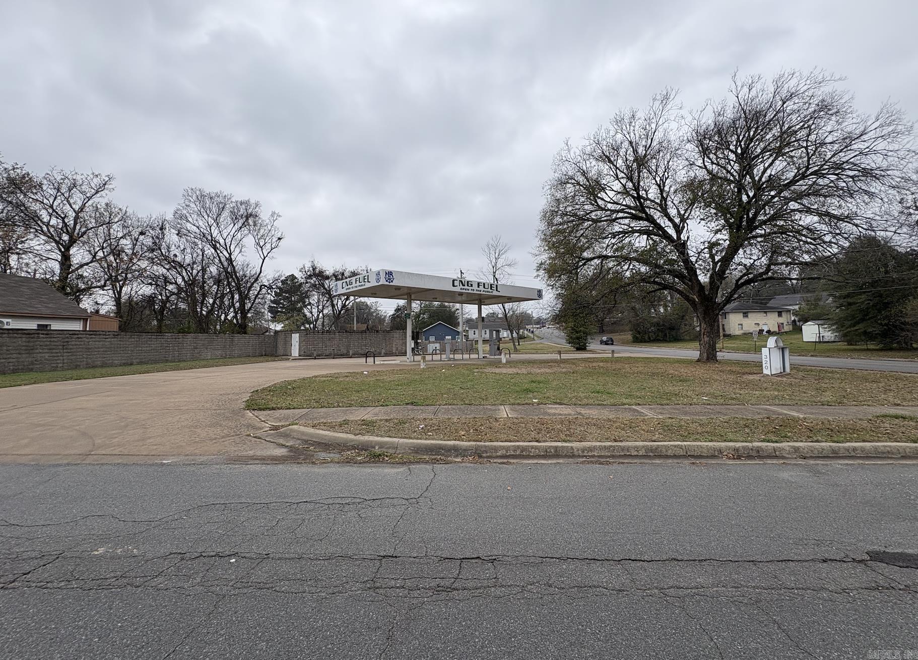 Prime commercial opportunity with exceptional visibility and high traffic counts, located just one block from I-30, which sees over 130,000 vehicles per day. Zoned C-3, this versatile property is ideal for a variety of commercial uses. Previously a CNG station, the existing infrastructure provides potential for conversion to a traditional fuel station, travel center, or other high-demand commercial operation. This flat, corner lot offers excellent access and frontage, providing maximum exposure and convenience. Perfect for development, expansion, or investment, this property offers strategic placement and endless potential in a rapidly growing corridor. Buyers should verify and calculate lot size using their own measurements.