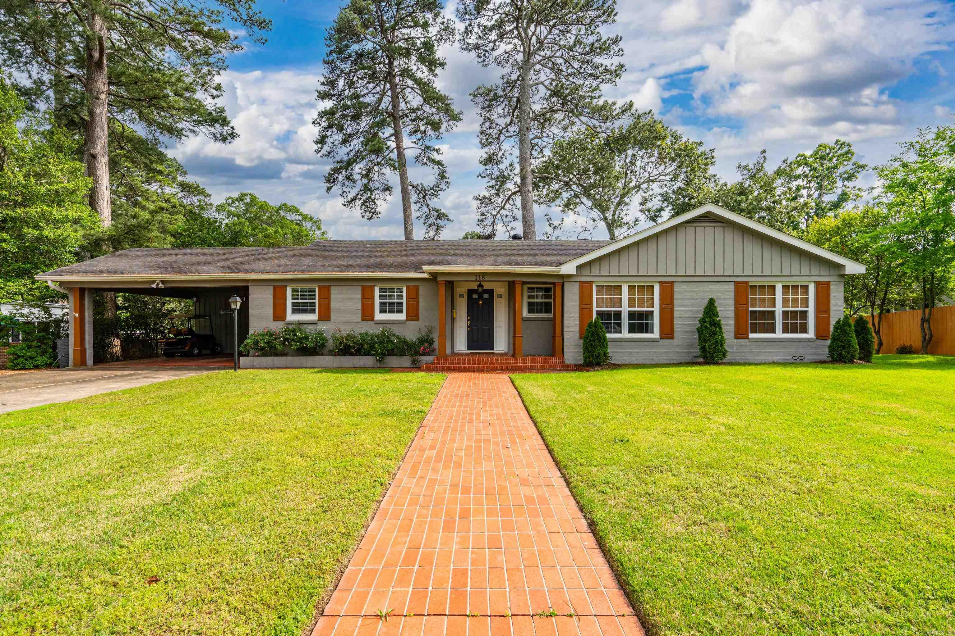 This beautiful home is situated next to Oaklawn Racing Casino Resort. Walkout of your backyard and watch the horses run. It's located in a wonderful, historic neighborhood centrally located to all the worldly pleasures Hot Springs has to offer. It has been completely updated without losing its historic charm. It features a large open kitchen, spacious den and living rooms. All three bedrooms feature its own bathrooms. This home is immaculate and move-in ready.